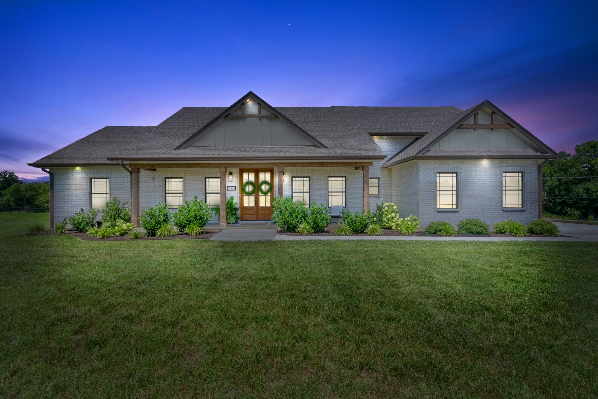 Completed in 2024 by Smith Custom Construction this STUNNER of a home has been UPGRADED to the nines and better than new. From the moment you walk through the double mahogany wood doors you can see and feel what sets it apart. Entering the foyer you will immediately find the white oak wrapped beams, fireplace mantle, and bonus room stairs upgraded and meticulously stained to match the white oak floors. The kitchen is a dream with a custom backsplash, custom soft close cabinets, under cabinet lighting, an island with extra storage, custom vent hood, pot filler, beautiful quartz counter tops, upgraded stainless steel appliances to include a gas stove fit for a chef. The pantry is outfitted with extra outlets for all your storage and small appliance needs. The house is also wired to be a fully functioning smart home with speakers already installed. There is also a Central Vac, and a Tankless hot water heater. The primary bedroom has a custom accent wall and gorgeous custom ceiling. You will also find a primary bathroom and closets fit for a king and queen with an over sized shower, beautiful tile, and custom closets and vanities. With the remaining 4 large bedrooms on the main floor and a bonus room with its own private bathroom there is room for everyone. Leading onto the patio are two sets of mahogany wood doors to match the front. The patio is set up and wired for two televisions and speakers for entertaining. A 500 gallon propane tank has been purchased and buried to convey at NO COST. There really is too much to list. Schedule your showing and make 240 Hall Ct yours!!