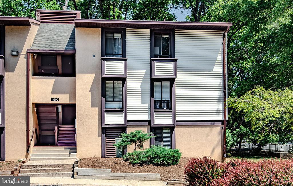 Welcome home to your newly remodeled, bright and open 2-bedroom, 2-bath condo in one of Reston’s prime locations. Major upgrades include HVAC System, Windows, Remodeled Kitchen & Bathrooms, Brand new Appliances, New LVP flooring (no carpet in unit) and New Washer & Dryer. HVAC system and Water heater are maintained and replaced under the Condo dues which also include ALL UTILTITIES. Enjoy private wooded views from your patio off the living and dining areas perfect for indoor and outdoor entertaining. Open floor plan for is great for guests or relaxing at home. The upgraded kitchen features brand new appliances, new quartz countertops, and upgraded lighting and cabinets, making everyday meals simple and convenient. Both bedrooms are generously sized with good closet space and wood flooring. The primary bedroom has an attached bath with marble shower and tile and vanity with Corian countertops perfect for easy morning routines. The second bedroom is conveniently located next to the hall bath and can also be used for telecommuting  or guests. The washer and dryer are located inside the unit, tucked neatly in the hallway for easy access. No shared laundry room. The private patio backs to trees, giving you a quiet and natural setting. Mature landscaping adds to the peaceful feel. The condo fee includes ALL UTILITIES- electricity, water, sewer, trash removal, snow removal, exterior maintenance, lawn care, pool access, and recreation facilities. Plus HVAC & Water Heater. Condo is part of the Reston Association, offering access to pools, tennis courts, walking and biking trails, tot lots, picnic areas, and open green space. You are surrounded by nature while still being close to everyday conveniences. The Metro station is less than a mile away. Reston Town Center, major commuter routes, shopping, dining, and Dulles Airport are all within easy reach. Assigned parking spaces plus visitor parking adds convenience. This home offers comfortable living, practical updates, and a well-connected Reston location all in one place.