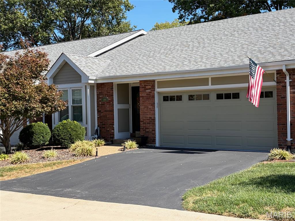 With over $100,000 in improvements, you’re going to love this beautifully updated Chesterfield Villa in the sought after, intimate, Woodfield Community! Once inside this inviting home, you’ll find the perfect combination of comfort, style and convenient main-floor living. The improvements include an extensively remodeled kitchen with beautiful quartz countertops, new cabinetry, updated flooring, and a spacious breakfast area. Additional improvements include newer windows and sliding doors, newer vinyl siding, a newer furnace & air conditioner, a newer garage door, and an epoxy-coated garage floor. The open floor plan features a spacious living room/dining room combo with a gas log fireplace, primary bedroom suite and the convenience of a main-floor laundry. Sliding doors provide access to the outdoor living area with a spacious, freshly painted deck and fence creating a wonderful setting for relaxing and entertaining. The impressive finished lower level offers exceptional versatility, with a second spacious living area featuring another gas log fireplace, wet bar with potential for expansion into a kitchenette, an additional bedroom, office and a full bathroom. You’ll love the walkout access to the patio providing even more entertaining space. Abundant storage adds to the home's practicality and additional highlights include the attached two-car garage and the irrigation system.  You’ll appreciate the comparatively low HOA fees and all the benefits of Woodfield Community living.  Besides grounds maintenance, road maintenance and trash service, other amenities include a swimming pool, clubhouse and tennis courts that are conveniently located just steps away! Ideally situated near Clayton and Baxter Roads, this wonderful home located within the Parkway School District offers easy access to shopping, dining and everyday necessities. With over $100,000 invested in improvements, two levels of comfortable living space and an outstanding location, this beautifully updated villa is one you won't want to miss!