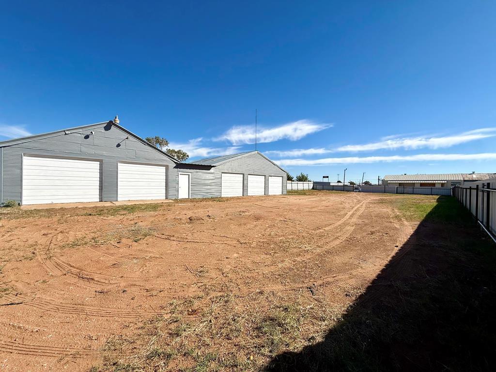 FOR LEASE! Location, Location, Location! This property is right in the city limits close to 8th street and Grandview with easy access to Highway 80 and IH-20. Sitting on over 1/2 an acre, it offers a large warehouse with five bay doors, and the entire property is secured with a six-foot metal fence. The inside is a blank shell, ready for a new business to add its own touches. With plenty of space and flexibility, this property is perfect businesses looking to grow. Seller may consider selling.