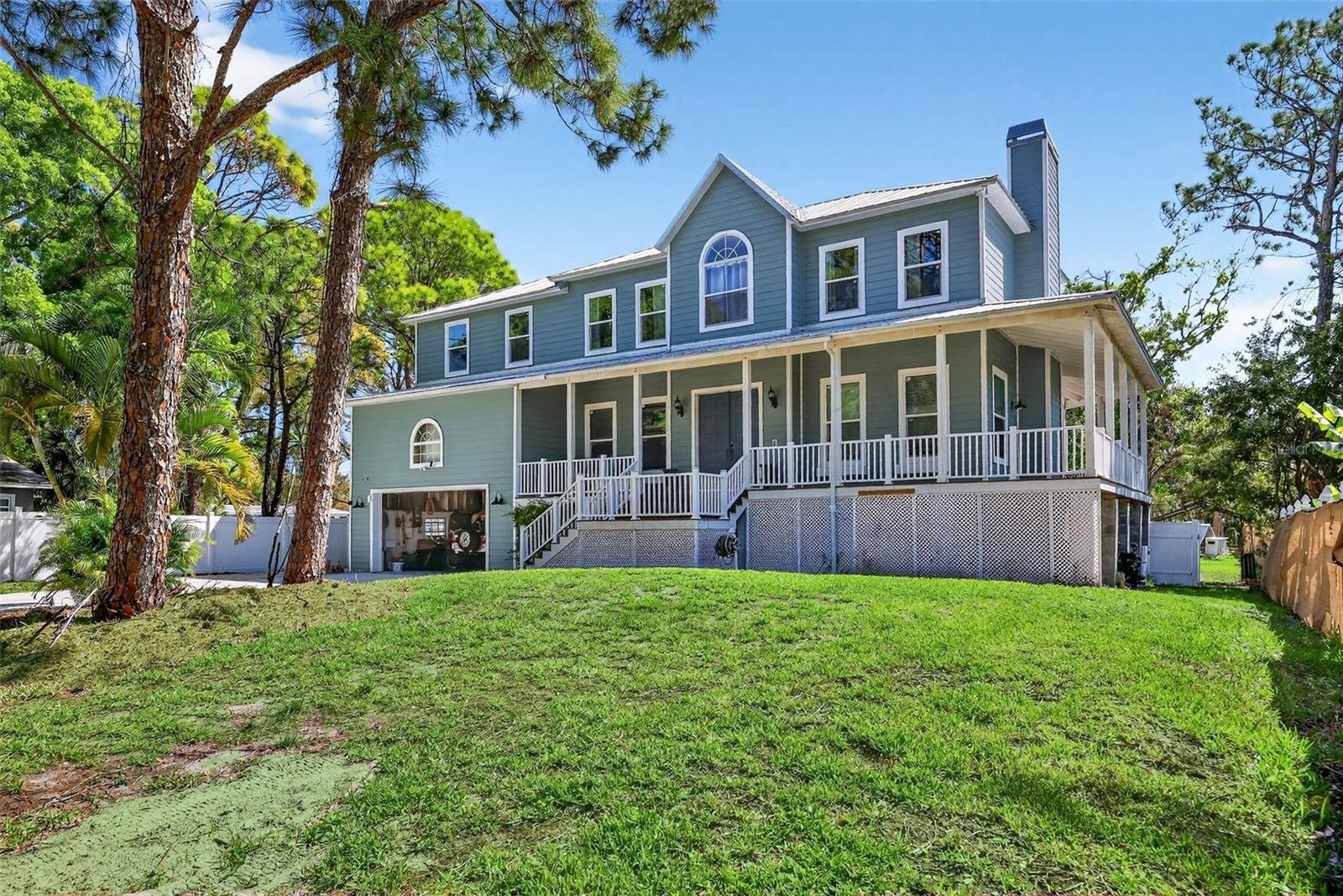 Nestled on over an acre of waterfront property, this fully updated estate at 4433 Sweetwater Drive offers the perfect blend of privacy, versatility, and coastal living. The main residence features 4 bedrooms, 3 bathrooms, and 2,666 sq ft of living space, highlighted by a metal roof, impact windows, recessed lighting, large basement and a wrap-around deck with new composite flooring. The gourmet kitchen boasts granite countertops, stainless steel appliances, and all-new cabinetry, while the spacious master suite includes a walk-in closet, dual vanities, dual shower heads, and a separate soaking tub. The upper level is designed for entertaining with a full game room, including a pool table and projector. Additional features include a two-car garage with vaulted ceilings and backyard pass-through access, upstairs laundry room, an 80+ ft concrete driveway with room for RV or boat parking, second driveway for the guest house and dual drainage systems for peace of mind.A fully equipped 1-bedroom, 1-bath guest house with its own driveway, kitchen, laundry, and living space offers excellent potential for multi-generational living or income production, with no city restrictions.Enjoy outdoor living with a brick patio, tiki hut, fire pit, above-ground electric pool, basketball court—all within a fully fenced property secured by a hydraulic remote gate. The newly installed permitted dock includes approvals for two boat lifts and provides quick access to open water, just 300 feet from a fixed bridge.A rare opportunity to own a private waterfront compound with endless lifestyle and investment potential.