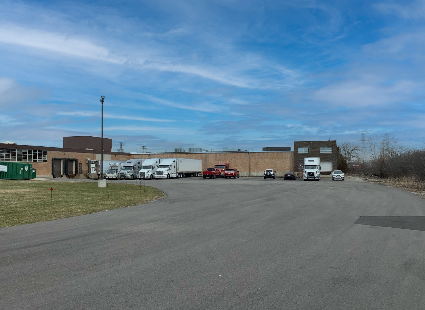 pleased to jointly offer this industrial building for sale in Wheeling, Illinois.  The masonry building built in 1962 and 1969 totals 96,959 square feet(SF) of mostly warehouse type industrial space with the front office portion along Noel Avenue totaling 6,500 SF and the Northeast 2 story office portion adding 3,424 of additional office space. The roof and parking lot have been replaced within the last 2 years and the building is in good condition.  The building is zoned I-2 and has heavy power, 14' ceilings, 5 truck docks, 1 drive in door, floor drains, and can accommodate outside parking on the 5.12 acre lot.  The warehouse portions of the building are broken up into 6 distinct sections that are internally connected by roll-up doors. Ideal for large single user or multi-tenant users. The current divisions are as follows:  * Unit 1 35,708 SF Warehouse  * Unit 2 18,000 SF Warehouse  * Unit 3 13,920 SF Warehouse  * 6,500 SF Front Office (divisible)  * Unit 4 6,204 SF Warehouse  w/ 1,711 SF Office and 2nd Floor Office  * Unit 5 3,900 SF Warehouse * Unit 6 8,850 SF Warehouse  The building is currently occupied by Precision Paper Tube Company, which would stay on as a tenant and lease back about 12 of the building, or vacate entirely, depending on which option is better for the buyer.  A new buyer could potentially take advantage of the 6B program to help alleviate the real estate tax burden.