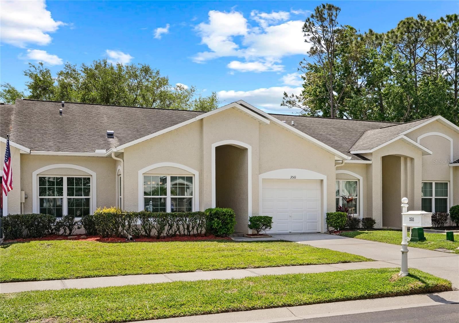 WATCH THE VIRTUAL TOUR! - Welcome to this beautifully maintained villa in the highly sought-after East Lake Palm Harbor Florida real estate market, one of the most desirable areas in Pinellas County, Florida. This light and bright 2-bedroom, 2-bath villa with an Office/Den (potential 3rd bedroom) offers 1,632 square feet of well-designed living space, a 1-car garage, and an enclosed Florida room.This Palm Harbor villa for sale features hardwood floors throughout the main living areas and ceramic tile in the kitchen and bathrooms. Fresh interior paint, recessed lighting in every room, and ceiling fans create a modern, move-in-ready feel with abundant natural light. Major updates include new windows (2014), water heater (2024), HVAC (2010), and a water softener. The HOA owns the roof, which was replaced in 2011—providing peace of mind and long-term value.Located in a gated community in East Lake Palm Harbor, residents enjoy premium amenities including a screened-in community pool, playground, park, tennis courts, and sidewalks—ideal for an active Florida lifestyle.This home is perfectly positioned near some of the best outdoor and lifestyle attractions in the Tampa Bay area. Just minutes to John Chesnut Sr. Park and Lake Tarpon boat ramps (2 miles), the Pinellas Trail (1.2 miles), and the world-famous Honeymoon Island State Park (11.5 miles). Easy access to Tampa International Airport (18 miles) makes travel convenient.Zoned for top-rated schools including Cypress Woods Elementary, Carwise Middle School, and East Lake High School, this home checks every box for buyers searching for Palm Harbor homes for sale, East Lake villas, and gated community homes in Pinellas County.