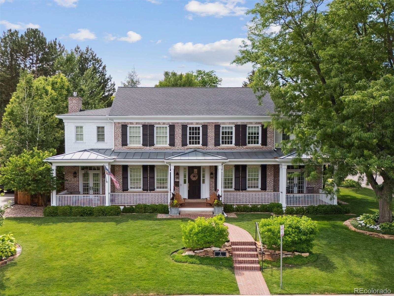 Poised on a picturesque corner lot overlooking Crestmoor Park, this custom traditional-style brick home exudes timeless elegance and warmth. Set on a nearly 12,000 square feet lot, the property offers thoughtfully designed indoor and outdoor spaces perfect for both everyday living and entertaining. The main level features a charming sunroom with a gas fireplace, a gourmet kitchen that opens to a spacious family room with custom built-ins, and three sets of French doors leading to a covered patio with a built-in grill—ideal for alfresco dining. A cozy library with built-ins, a dedicated craft room with tons of storage, and a private main-level office add functionality and character. Upstairs, five generous bedroom suites each offer comfort and privacy with their own en-suite baths. The finished basement is a retreat of its own, boasting a large family room with full bar, game room, a guest suite, and exercise room that can also be a 7th bedroom. Enjoy morning coffee on the expansive covered front porch or host gatherings on the back patio. The property also features hardwood flooring throughout the main and upper levels, a centralized audio/video system and heated driveway and walkways for year-round convenience. Ideally located just down the street from the exclusive Crestmoor Swim & Tennis Club, in which homeowners get priority for expedited membership, this home is within walking distance of an award-winning elementary school and minutes from renowned private schools. With easy access to dining and shopping at nearby Boulevard One, this is a rare opportunity to own a distinguished home in one of Denver’s most coveted neighborhoods.