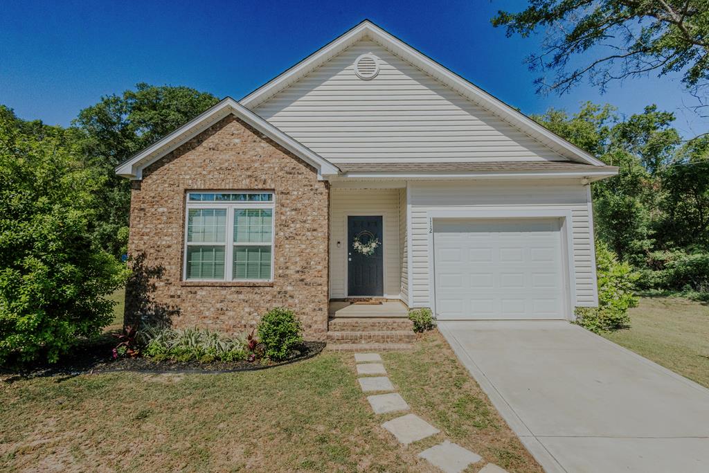 Welcome to 112 S. Kirby Street in the Charming town of Boston, Georgia! Built in 2021, This Beautiful 3 Bedroom 2 Bathroom home is approximately 1494 Sq. Ft and has a spacious feel to it with the open concept kitchen. There is an abundance of Cabinets in the kitchen for all of your storage needs. Laminate Flooring throughout the homes makes for easy cleaning. Large Primary Bedroom attached to its own Primary bathroom that includes a Walk-in Shower. Laundry Room. Single car garage along with paved driveway and parking pad. The back yard is fenced in and also comes with a nice storage building. Sit out on your covered back porch to enjoy your evenings with a cold glass of lemonade. This home is Move-In Ready and awaits its new family. Give your favorite Realtor a call today to schedule you a showing!