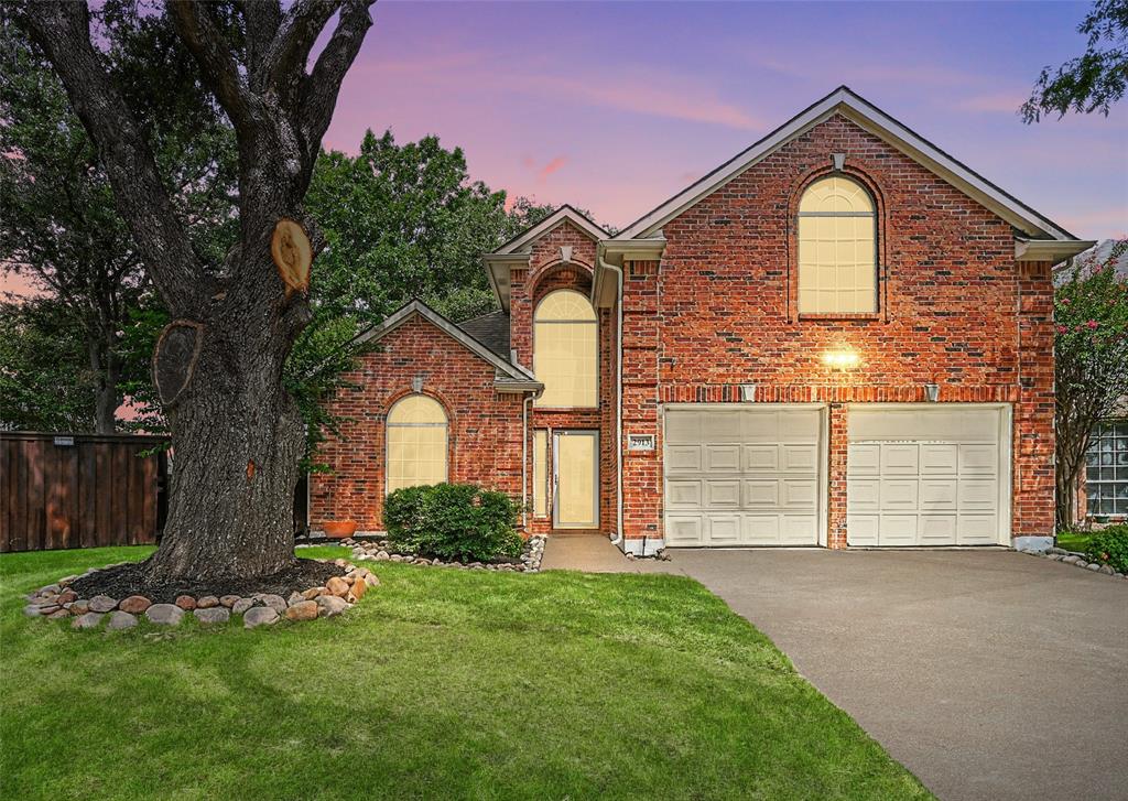 WELLINGTON BEAUTY ON AN OVERSIZED CUL-DE-SAC LOT WITH MATURE TREES! Feel the charm the moment you step inside to extensive wood flooring, crown molding, soaring ceilings & an open-concept floor plan, plus a garage with epoxy flooring & recently replaced garage door openers. Cook with ease in the chef’s kitchen featuring granite countertops, stainless steel appliances, tons of cabinets for storage, an island & a pantry, or relax & recharge in the downstairs primary suite boasting a dual sink extended vanity, jetted tub, separate shower & a large walk-in closet. Unwind in the cozy family room showcasing a gas log fireplace & built-in cabinets, or make great use of the upstairs offering a game room, generous secondary bedrooms & a bathroom. Outside, enjoy a spacious backyard made for relaxing or entertaining, complete with a covered patio that’s perfect for weekend barbecues or quiet mornings with coffee. Wellington residents have access to pools, playgrounds, tennis courts, pickleball, volleyball, basketball, a 3-hole putting green, 9-hole disc golf, a fitness center, lakes, miles of trails & more! Attends top-rated Flower Mound schools!