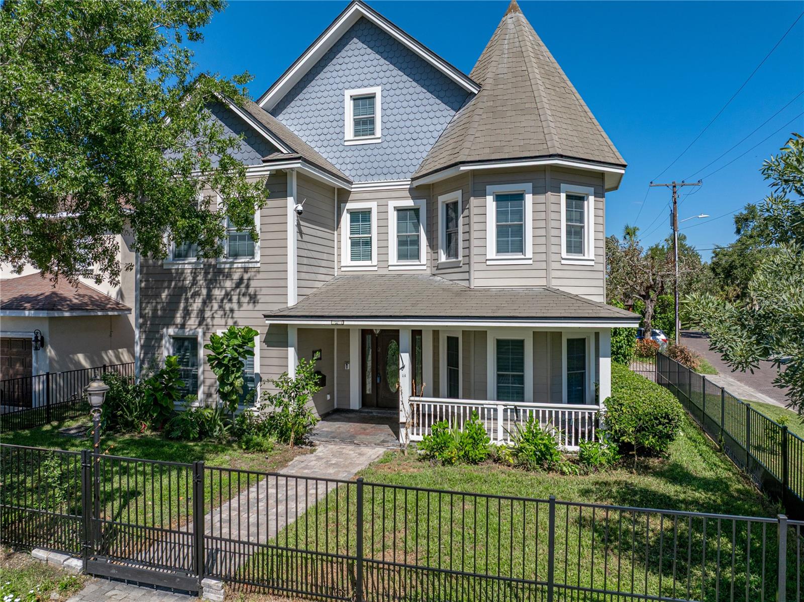 Absolutely stunning 3 story, 4BR/3.5BA corner home located in South Tampa’s Palma Ceia neighborhood, just blocks from Palma Ceia Country Club and Bayshore Blvd. Built with 7.75” thick Insulated Concrete Forms (ICF) and reinforced with #5 rebar both horizontally and vertically every 24”. The exterior is covered in Hardie board siding that is both rot-resistant and self-extinguishing with all facia and trim boards made from MiraTEC hybrid wood material. The windows are Simonton Stormbreaker Plus hurricane impact rated up to 140mph. Upon entry, you will find beautiful solid Brazilian cherry wood floors throughout the entire first floor, third floor, and part of the second floor. To the right is the living room, showered with natural light! To your left is the dining room which seamlessly flows into the spacious kitchen, making an impressive space for those holiday get-togethers with family and friends. The kitchen, including the island, features gorgeous granite counters. Tons of additional custom made solid maple cabinetry, a wine fridge and built-in wine rack, 6 burner Dacor gas range, plus GE Monogram built-in stainless oven and microwave, refrigerator, and vent hood gives the kitchen a grand feel. Around the corner is the media room, a welcoming environment suitable for spending time with your family, and a half bath. The second level includes three bedrooms, a gym, and the laundry room. One bedroom is flooded with natural light and features an oversized walk-in closet with custom built-ins as well as an En Suite with a dual sink vanity and large walk-in tiled shower. The two additional bedrooms  are connected via a Jack and Jill bathroom that includes a generous dual sink vanity and glass shower. One bedroom includes a Murphy bed cabinet. The laundry room includes a stainless wash sink and laundry chute from the Primary bedroom upstairs. The gym has been equipped with a padded floor for comfortable workouts! (This could easily be utilized as an office or even a playroom.) Also located on the 2nd level is an enclosed balcony with a water supply and drain and an enormous storage room under the stairwell. Moving up to the 3rd level finds your oasis, the Primary bedroom. Unique built-in features define this space including two window boxes and built-in shelving. The En Suite will take your breath away boasting TWO ample walk-in closets with custom built-in organization, a contemporary freestanding tub, a considerable walk-in shower with a waterfall shower head, oversized bench area, and an L-shaped double vanity with loads of space. So many upgrades were included in this beauty: crown molding throughout the home, architectural composite slate roof shingles, a whole house natural gas generator, and tankless water heater. Out back is an outdoor kitchen with a stainless steel Viking grill and griddle with a vent hood and a prep sink. Another added feature is a whole house water filter and descaler. This remarkable home is a MUST SEE! Contact me today for a showing!