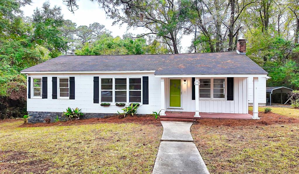 Welcome home to this beautifully remodeled residence in the heart of Downtown Thomasville! Blending timeless Southern charm with modern design, this home offers the perfect mix of comfort, convenience, and style—all within walking distance to local shops, dining, and the park.  Step inside to find a custom kitchen with quartz countertops, stunning cabinetry, and all-new stainless-steel appliances, including a gas range. The open-concept living and dining areas are warm and inviting, highlighted by a cozy gas fireplace—perfect for gatherings or quiet evenings in.  The spacious primary suite offers a peaceful retreat with a luxurious master bathroom, complete with a walk-in shower, large master closet, and modern finishes. Additional bedrooms provide plenty of flexibility for guests, family, or a home office.  Outside, enjoy a new deck overlooking a private backyard that is ideal for entertaining or relaxing, along with a covered parking area for convenience.  This move-in-ready home combines classic character with thoughtful updates in one of Thomasville's most desirable locations.  Experience downtown living at its best—schedule your showing today!