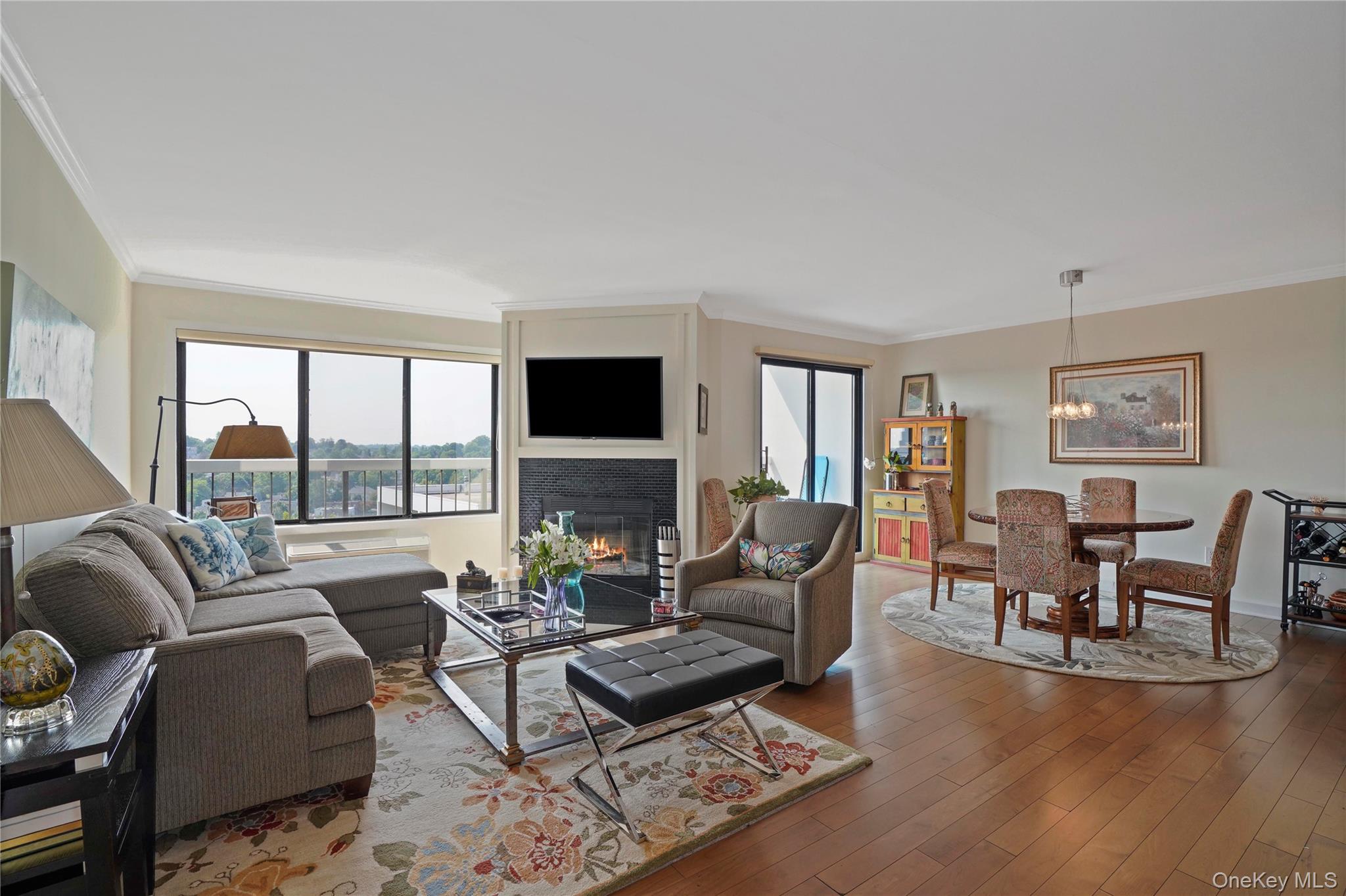 This exquisite penthouse apartment exudes an aura of elegance, openness, and sunlit splendor. The expansive view, the fireplace, and the newly renovated kitchen, open to the living room , featuring an expansive granite counter, extra cabinets and room for stools, create an inviting ambiance. The popcorn ceiling has been replaced, and the bathroom has undergone a complete remodel. There are new doors and hardwood floors are throughout the living and dining areas. An outfitted walk-in closet is available for hanging your attire. Additionally, the terrace offers breathtaking views of the surrounding area, and ample windows provide natural illumination. Furthermore, the apartment boasts a deeded garage parking space for your convenience. All of this is located in HIGHPOINT OF HARTSDALE. A community that offers exclusive amenities to its owners, including a 24-hour gate house to announce guests, an Olympic-sized pool with a large deck, a kiddie pool, playground, 24-hour gym, sauna, club house with a fully equipped kitchen for large parties, card/party rooms in each building, on-site management, 24-hour security, a bike room, private storage room, laundry on each floor, an active social community, and beautiful landscaping. Additionally, there is ample parking for guests. All these amenities are conveniently located just blocks away from restaurants, shopping, downtown White Plains, and the train. Come and experience the High Point lifestyle.
There is a capital assessment for this apartment in the amount of $46,304.82 . The current balance owed on October 1,2025  will be $30,869. Buyer can choose to pay the assessment one of  3 ways.  Single payment, over 8 months with no interest or monthly, over 15 years with interest beginning Jan. 2026. Further Details provided upon request.