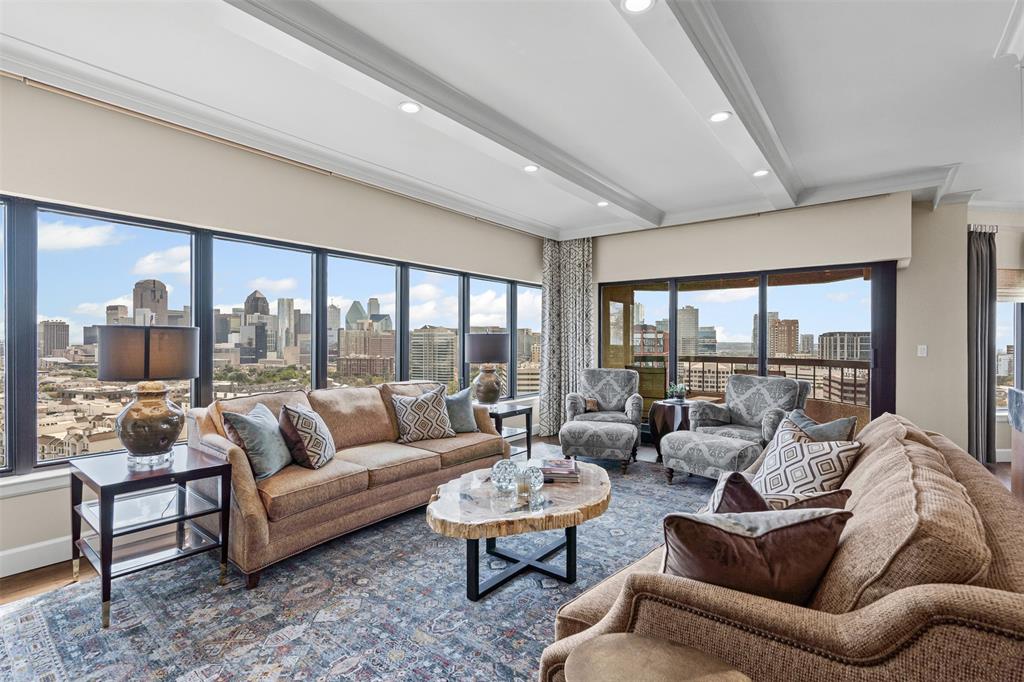 Perched on the 19th floor of the prestigious LaTour Condominiums, this completely remodeled 2-bedroom, 2-bathroom residence at 3030 McKinney Avenue #1906 epitomizes sophisticated urban living with 1,774 square feet of meticulously crafted luxury in the heart of Uptown Dallas. Showcasing the finest finishes throughout, this exceptional home features premium solid-core doors, exquisite hardwood and marble flooring, and seamlessly integrated built-in appliances. Open-concept layout with a neutral color palette that complements the abundance of natural light. The living and dining areas are highlighted by oversized picture windows with electric shades, thoughtfully designed to frame the cityscape and create a bright, inviting atmosphere. A private balcony extends your living space outdoors, providing the perfect setting for morning coffee or evening relaxation with a view. This distinguished residence offers the ultimate in convenience with two assigned parking spaces and a storage unit. Residents enjoy an unparalleled lifestyle with resort-caliber amenities including 24-hour concierge and valet service, state-of-the-art fitness center, sparkling pool with cabana, tennis and pickleball courts, and dedicated dog park. With a coveted 98 Walk Score placing McKinney Avenue's finest shopping, dining, entertainment, and the iconic McKinney Avenue Trolley mere steps away, this turnkey masterpiece represents the pinnacle of cosmopolitan elegance in Dallas's most sought-after address. Two deeded parking spaces and a storage unit is included!