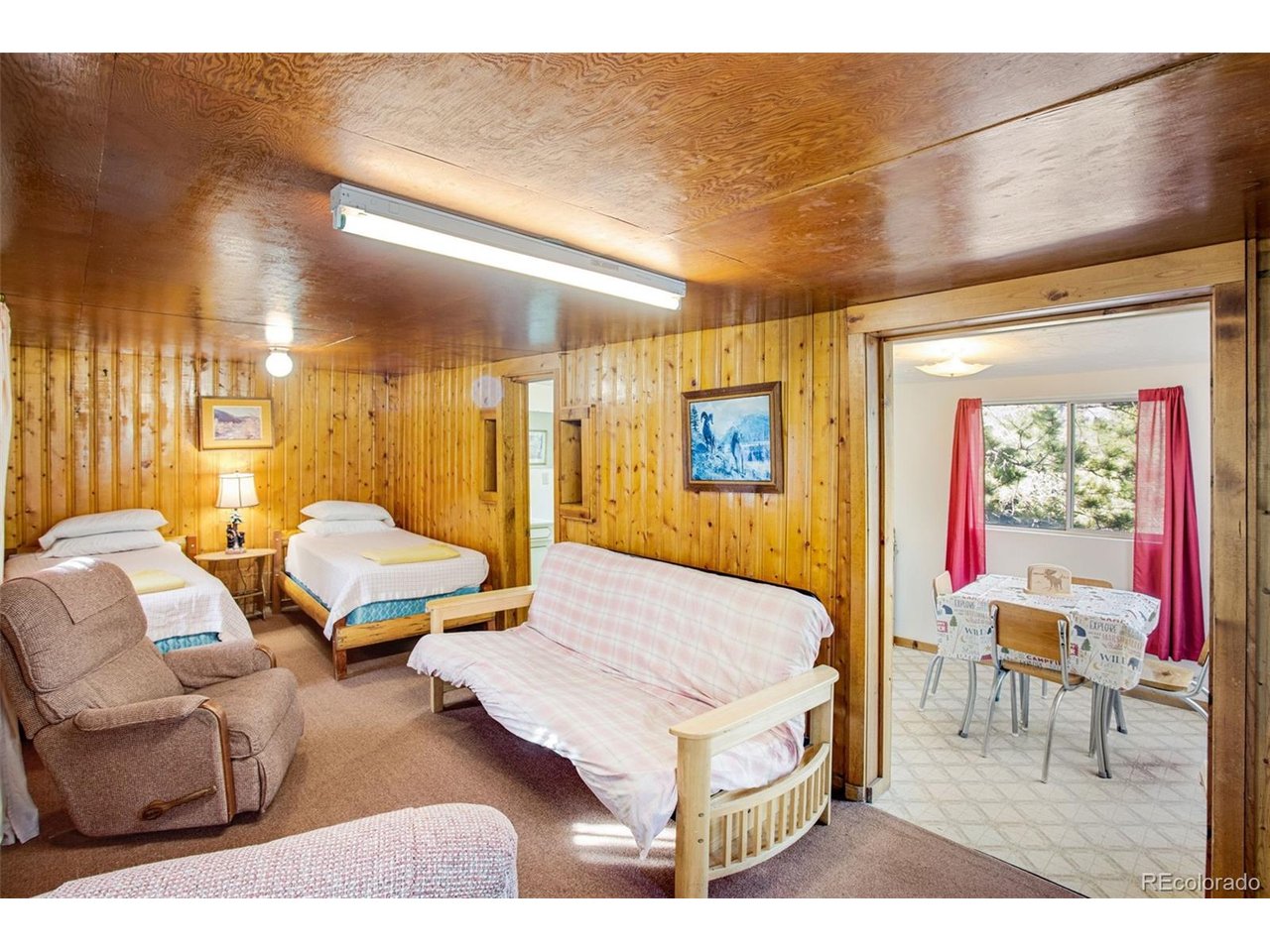 An incredible opportunity to own historic Sportsman's Lodge on 5.56 acres with 1,000 feet of Cache La Poudre River frontage. Property includes 12 furnished cabins, 10 RV spaces with room to expand, retail gift shop sold with all inventory (Above shop is currently used as storage but has 2 rooms and a 1/2 bath. All inventory is included), game room/office or potential second dwelling, primary residence with 2 beds and 2 baths and forced air heat, storage building, large detached garage, pond, playground, picnic area, dozen included BBQs, horseshoe pits, 2 wells, 3 septic systems, 6 leased propane tanks, 11 wood stoves, 2 all season heated 3/4 baths, and open zoning. Operated continuously since 1931, this rare income-producing property offers endless possibilities. Lease the home and operate the business, or live onsite while running the lodge. Nearly 6 acres of historic cabins and private riverfront create a true Colorado mountain retreat. Previously used as a restaurant and can be re-converted. With 300+ days of sunshine annually, enjoy hiking, fishing, hunting, rafting, climbing, camping, horseback riding and abundant wildlife right outside your door. Relax to the sounds of the river and enjoy peaceful mountain living under the stars. Conveniently located near Sleeping Elephant Mountain, Big South Trail, Glen Echo Gas, Canyon Grill, Chambers Lake and Poudre Falls. Comfortably located at 7,849 feet above sea level. Please email for additional property information or to schedule a showing. This is an active business, so advance notice is appreciated.