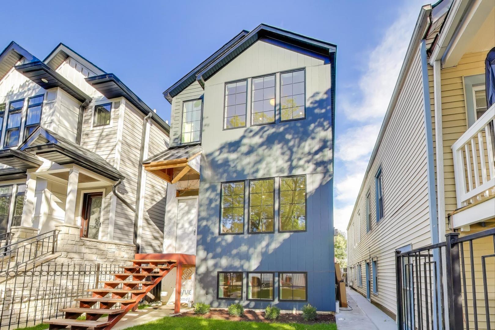 Stunning new construction in Irving Park East/Horner Park! This 5 bed/3.5 bath single-family home spans 3 levels of thoughtfully designed living. A rare 20-foot-wide home-one foot wider than most on this size lot-designed with tall ceilings for an even greater sense of space.  The first floor features a living room with fireplace, dining room, kitchen w/ breakfast area, and a bright rear family room with a second fireplace. Wide-plank hardwood floors flow through the main and second levels, with durable LVT below. The chef's kitchen boasts rift white oak cabinetry, quartz countertops, butler's pantry with custom shelving, Wolf 6-burner range & SubZero fridge/freezer. Upstairs offers 3 bedrooms plus a large laundry room. The primary suite impresses with dual walk-in closets with custom closet systems, heated floors in en suite bathroom, dual vanity, walk-in shower w/ heated bench, and a freestanding soaking tub. Lower level includes 2 bedrooms, full bath, and rec space.  No detail was missed, the home is prewired for sound and electric blinds.  Blown-in insulation between all floors and bathroom walls for sound attenuation.  All windows are premium aluminum clad wood.  Hardieboard exterior, EV ready 2-car garage, and an unbeatable Horner Park location complete the package!  Close proximity to McFetridge Sports Center, California Park Pool, Chicago River Running/Biking Path, and area dining/shopping.