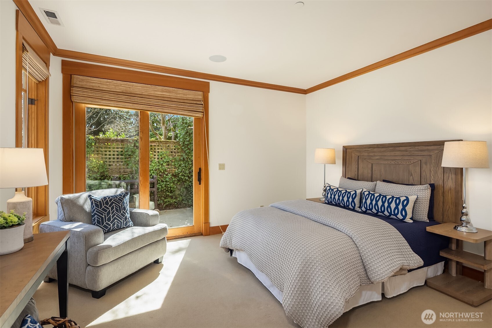 Slip away to the quiet bedroom by the water's edge in the guest house, where soft light, stillness and lakeside calm create a dreamy retreat.