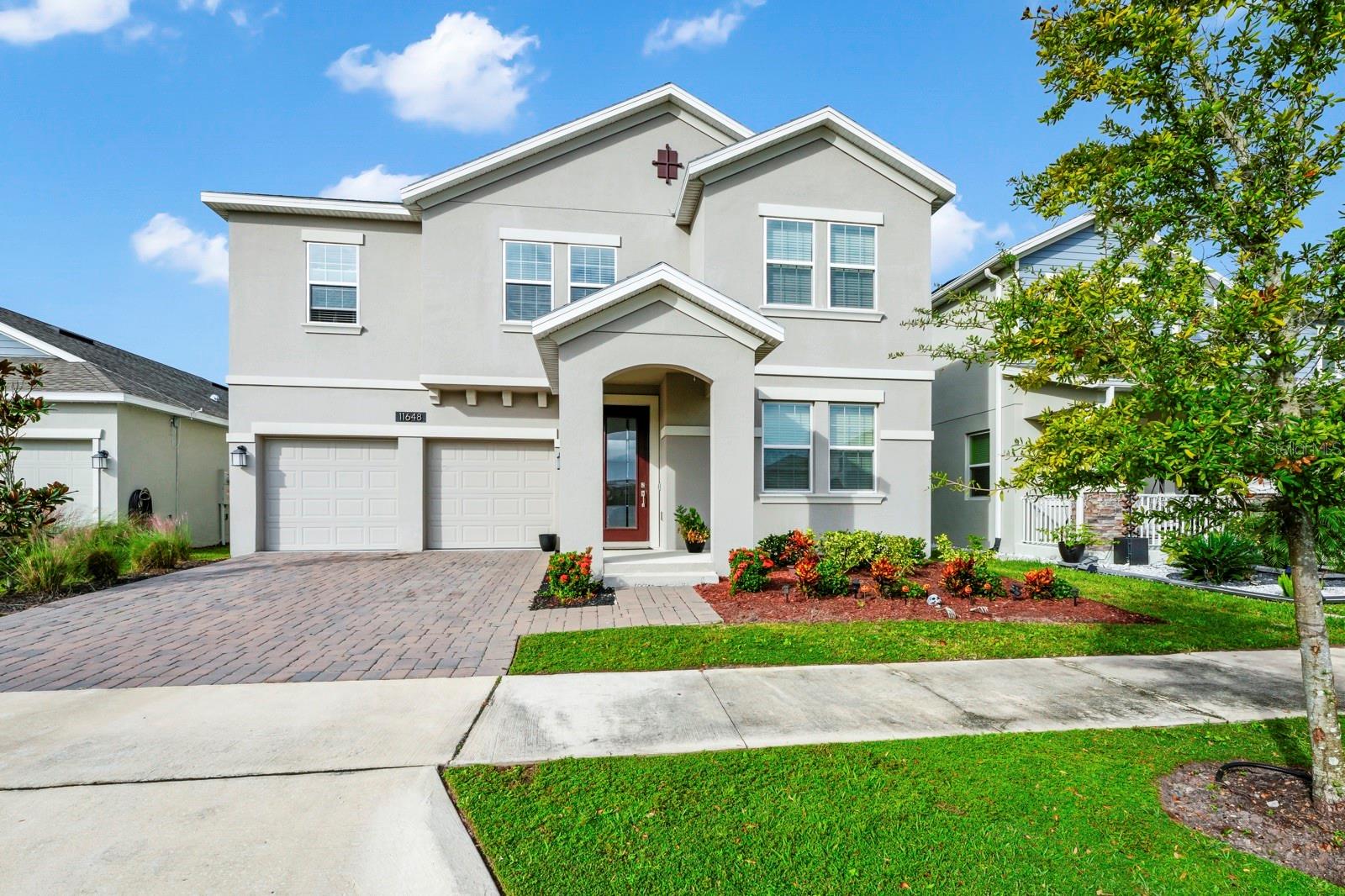 Welcome to this exquisite two-story residence situated in the coveted Lake Nona master-planned community of Storey Park. Embrace eco-friendly living and cost savings on your utility bills with this solar-powered home. This 4-bedroom, 2.5-bathroom residence perfectly complements contemporary lifestyles. Upon entering, the ground floor features a flexible office space at the front of the house, while the rear boasts an expansive Kitchen-Great Room area. The kitchen offers a generously sized pantry, stainless steel appliances, 42-inch white cabinets, and elegant quartz countertops. The spacious 16x25 Great Room is an ideal setting for movie nights with friends and family. Upstairs, you'll discover the serene Master Bedroom Retreat alongside three generously proportioned bedrooms. The master bedroom is flooded with natural light, adorned with a tray ceiling, and boasts ample living space. The bathroom oasis features a dual-sink vanity with quartz countertops, a spacious walk-in shower, a separate garden tub, and an enormous walk-in closet. A great size backyard which is perfect for outdoor entertaining and summer cookouts. Storey Park offers a wealth of amenities, including a beautiful pool, a fully equipped gym, a community clubhouse, walking trails, a dog park, and a playground. Sports enthusiasts will appreciate the basketball court, tennis court, and volleyball court. This property is zoned for top-rated schools and conveniently located near SR 417 and SR 528, providing easy access to popular destinations such as Lake Nona, Medical City, Orlando International Airport, and the attractions.