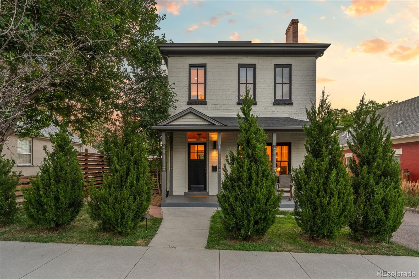 A rare offering in the heart of Denver's coveted LOHI neighborhood, 2417 W. 35th Ave. masterfully blends historic architecture with sophisticated modern design. Originally built in 1880, this exceptional residence has been meticulously reimagined through a comprehensive renovation and thoughtfully integrated addition, preserving its timeless character while introducing elevated finishes and contemporary comfort throughout. The light-filled, open-concept floor plan is designed for effortless living and entertaining, where expansive living and dining spaces flow seamlessly into a stunning chef's kitchen featuring premium appliances, designer finishes, custom cabinetry, and an oversized island. Walls of glass open to a private backyard retreat, creating an exceptional indoor-outdoor lifestyle with multiple spaces for dining, relaxing, and entertaining beneath Colorado's beautiful skies. Upstairs, Laundry, four beautifully appointed bedrooms provide peaceful retreats, including a luxurious primary suite with vaulted ceilings, a spa-inspired bath, and a custom walk-in closet. Rich architectural details—including exposed brick, natural stone, custom millwork, and carefully curated finishes—create a warm yet sophisticated ambiance that honors the home's heritage while embracing modern luxury. The finished lower level offers exceptional flexibility with space for a media room, family room, fitness studio, home office, or guest retreat. Additional highlights include a spacious mudroom, abundant storage, all newer mechanical systems, and a detached garage. Perfectly positioned just moments from Denver's finest restaurants, boutique shopping, coffee houses, parks, and downtown, this extraordinary residence offers the rare opportunity to own a home where timeless craftsmanship, inspired design, and one of the city's most desirable neighborhoods come together in perfect harmony.Virtual Link:  https://listings.creativeedgemedia.com/videos/019f8abb-7a5e-70a4-82fd-b8b2eefbdfb7