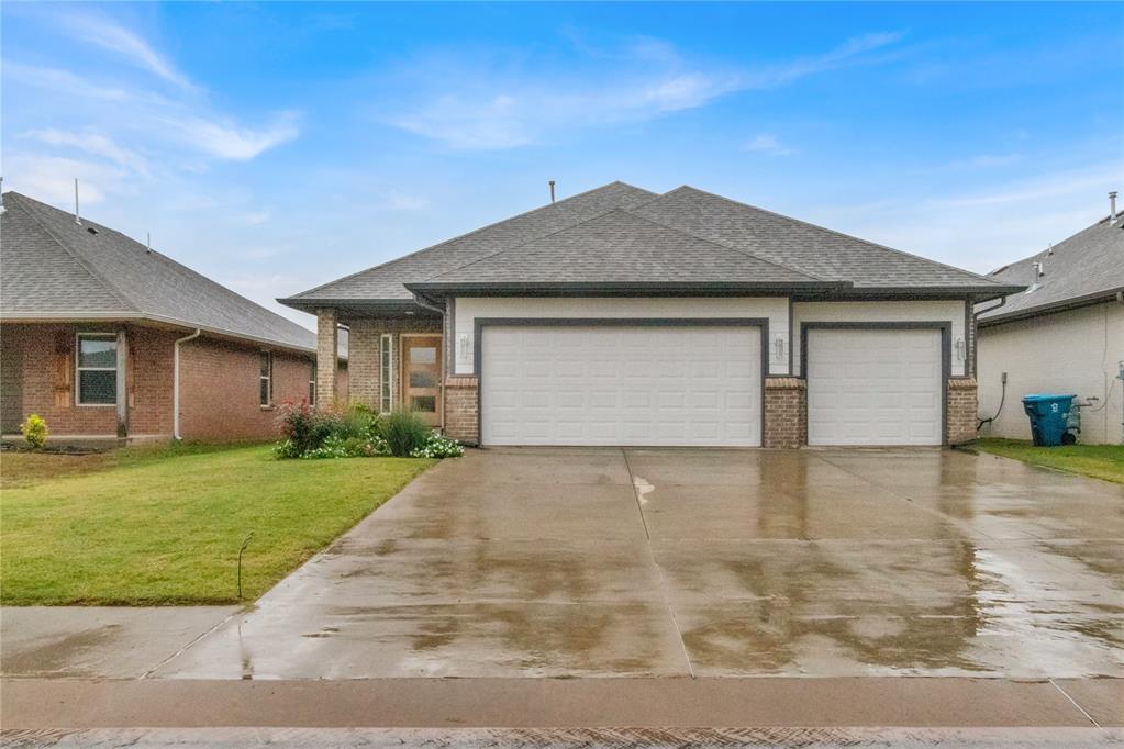 Experience modern comfort and timeless style at 2400 Alta Vista Ln! Nestled in one of Edmond’s sought-after communities, this 3-bedroom, 2-bath residence offers 1,661 sq ft of beautifully designed living space. The open-concept layout highlights a stunning corner fireplace with a mantle, while the kitchen features a spacious island with breakfast bar seating, elegant tile backsplash, and abundant counter space. The primary suite provides a true sense of luxury with dual vanities, a deep soaking tub, a separate walk-in shower, and an expansive closet. Ideally located just minutes from top-rated schools, shopping, dining, and quick access to I-35. Enjoy the neighborhood playground just a short stroll away, perfect for an evening walk or weekend fun.
