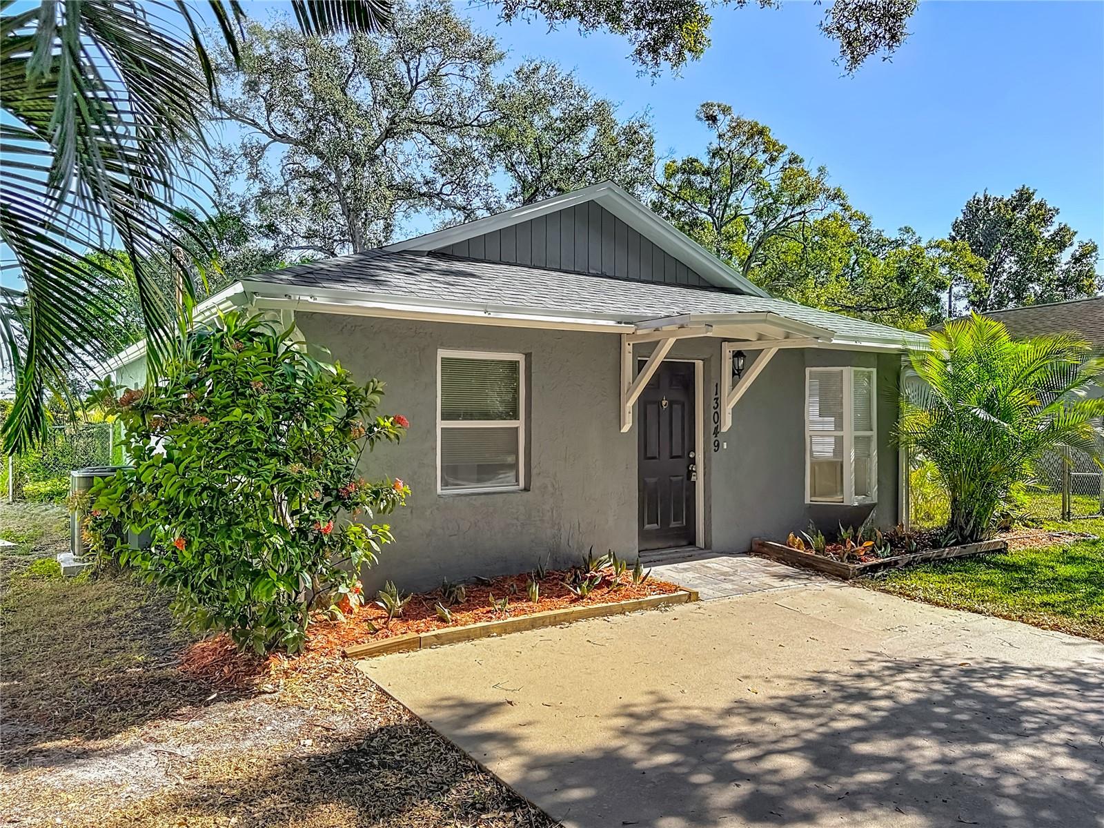 This beautifully remodeled 3/2 cottage is centrally located in Largo, just off of Ulmerton Rd. Minutes to shopping and the beaches, this home really embodies the phrase 'LOCATION, LOCATION, LOCATION.' With a brand new roof, new central AC unit, and a sizable, fenced back yard, this house is ready for you to call it HOME. The home features brand new stainless steel appliances, vaulted ceilings, luxury vinyl plank flooring throughout, all new white cabinetry, fresh paint inside and out, a patio with pergola, and quartz countertops in the kitchen. This one is truly a must see!