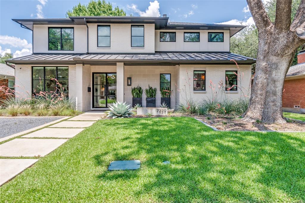 Welcome to 7229 Haverford – a thoughtfully reimagined custom home by Ryan Bozeman Homes. Built in 2020 and zoned to highly sought-after Lakewood Elementary, this stunning home blends sophisticated design, modern luxury and everyday functionality in one of Dallas’s most desirable neighborhoods.  Step inside to find 10-foot ceilings, rich white oak hardwood floors and abundant natural light throughout. The first floor features a dedicated home office and a beautifully open-concept layout, ideal for effortless entertaining and everyday living.  The chef’s kitchen is a true showpiece—featuring Wolf appliances, a Sub-Zero wine fridge, custom soft-close cabinetry, designer tilework, a custom brass vent hood, pot filler and a dramatic quartzite waterfall island with seating. The kitchen flows into the spacious living room with a custom gas fireplace, built-in cabinetry and high-efficiency windows offering both comfort and energy savings. Enjoy immersive sound with a Sonos system installed throughout the home.
Retreat to the luxurious primary suite, complete with a spa-inspired bath boasting dual sinks, a soaking tub, separate shower and a gorgeous custom walk-in closet.  The main level also includes two stylish half baths and a functional laundry room with ample counter space and storage.  Upstairs, you'll find three generously sized bedrooms—each with walk-in closets and ensuite bathrooms—plus a loft area ideal for a home gym, study zone or creative space. The spacious game room is perfect for movie nights or family gatherings.  Step outside to a covered patio overlooking the expansive backyard with raised garden beds—a peaceful setting for outdoor entertaining, grilling or simply relaxing.  Every inch of this home reflects meticulous attention to detail, quality craftsmanship and designer finishes. Ideally located near White Rock Lake, scenic parks and trails and all the shopping and dining Lakewood has to offer. Don’t miss this rare gem in the heart of East Dallas!