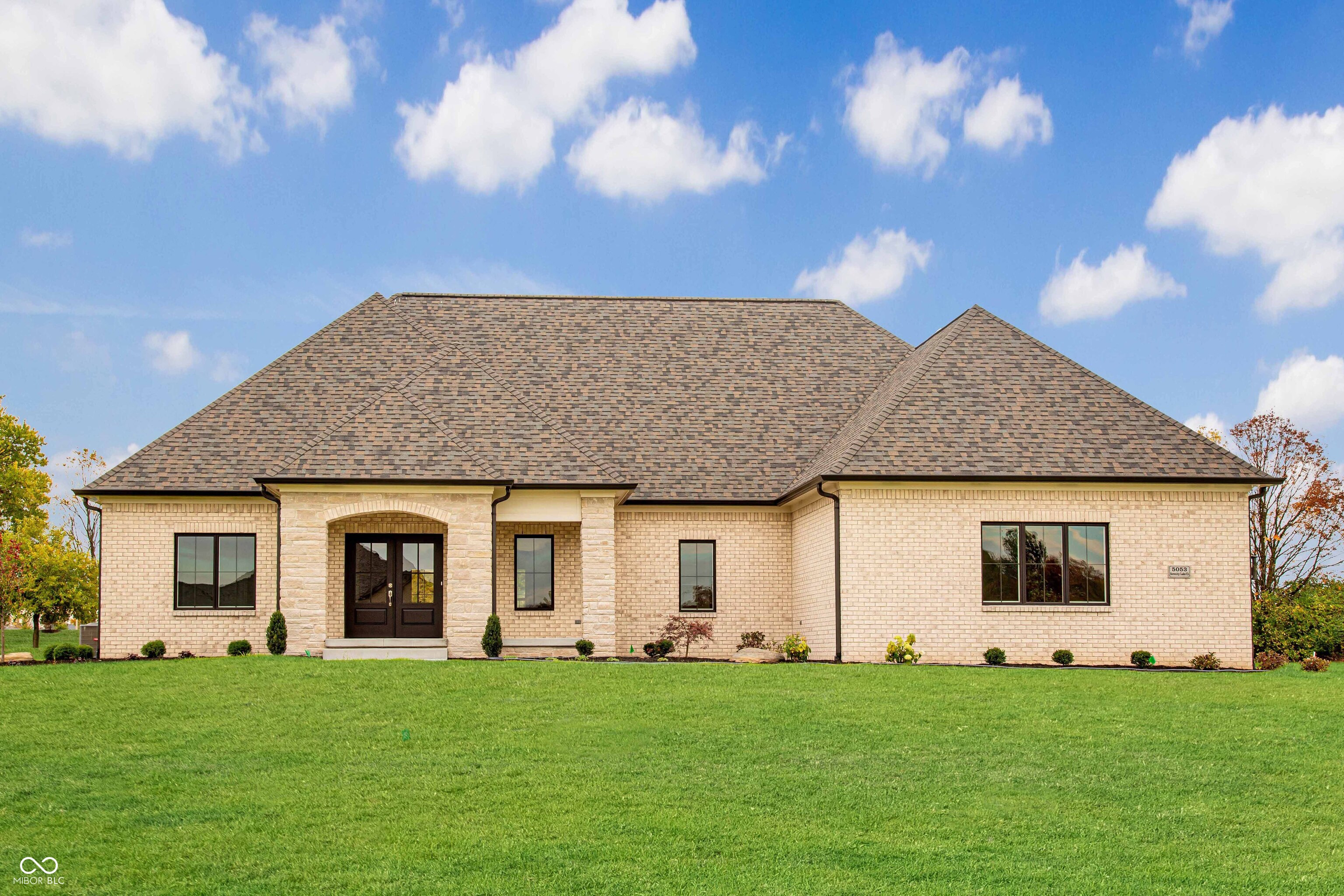 Luxury and comfort meet in this stunning custom home in the desirable Kensington neighborhood, just minutes from the high school and convenient interstate access. The main level features three bedrooms including a serene primary suite, an open Family Room-Kitchen-Dining layout, a back-kitchen style pantry, a functional mudroom, and a covered porch with a fireplace for year-round enjoyment. The finished basement offers a media area, game space, walk-up wet bar, and a flexible fitness room or office, creating the perfect blend of elegance and livability. - This is a proposed build by Duke Homes.