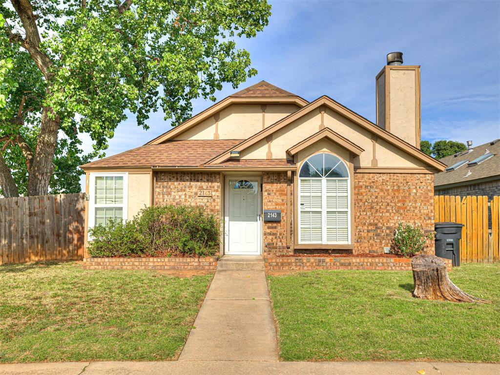 Perfectly situated on a tree-shaded corner in a neighborhood with sidewalks, near Westmoor Trails Park!  This partially updated brick home features granite counters, vinyl-clad tilt-in windows, solid floors throughout, and skylights illuminating the kitchen and bathroom. Filtered cold H2O tap. All appliances are included!  STORM SHELTER in garage and double-wide gate.  Price reflects the capacity for some updating and cosmetic repairs, but you can't beat the price for this location!  Westmore Trails Park features water pad, shelter, playground, and walking trails.