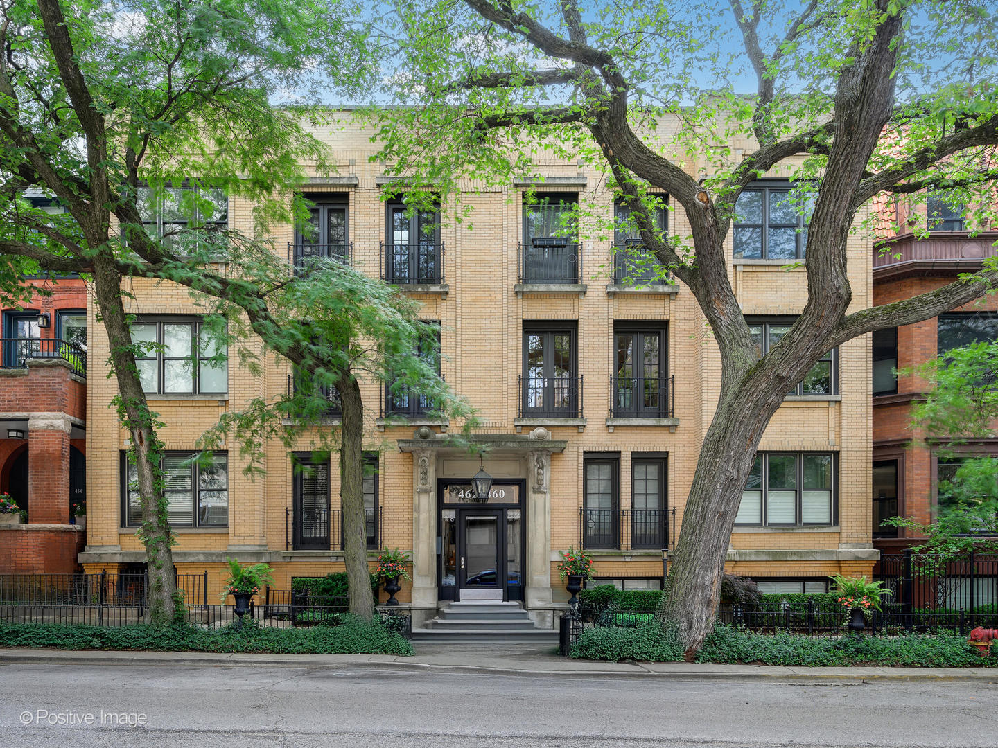 Rarely available and very special in East Lincoln Park 1600+sqft  two bedroom, two bath condo in an intimate condo building.  This home features a South facing living room with french doors leading to Juliette balconies, gas fireplace with Carerra marble surround and beautiful built-in bookshelves!  This very livable floor plan has an upgraded kitchen with an over-sized island, custom white cabinets, Vermont Danby marble counter tops,  illuminated upper cabinets and stainless appliances.  Off the kitchen is a brand new deck perfect for your largest bar-b-que grill as well as table and chairs for relaxing!  The primary bedroom includes a sunroom (ideal as an office), custom outfitted walk-in closet and an en-suite spa bathroom with a double sink vanity and jetted tub.   The second bedroom is fitted with a wall of custom storage.  The dining room (adjacent to the kitchen) is perfect for a large table and has built-in cabinetry as well as a wine refrigerator.  It is a perfect spot for entertaining.  Deeded parking space #68 is right out the back door in a private, gated lot and is included.  More features included LED recessed lighting, hardwood floors throughout and a full sized washer/dryer. Pet friendly. This home is just a block from Lincoln Park as well as all of the restaurants on Clark Street.