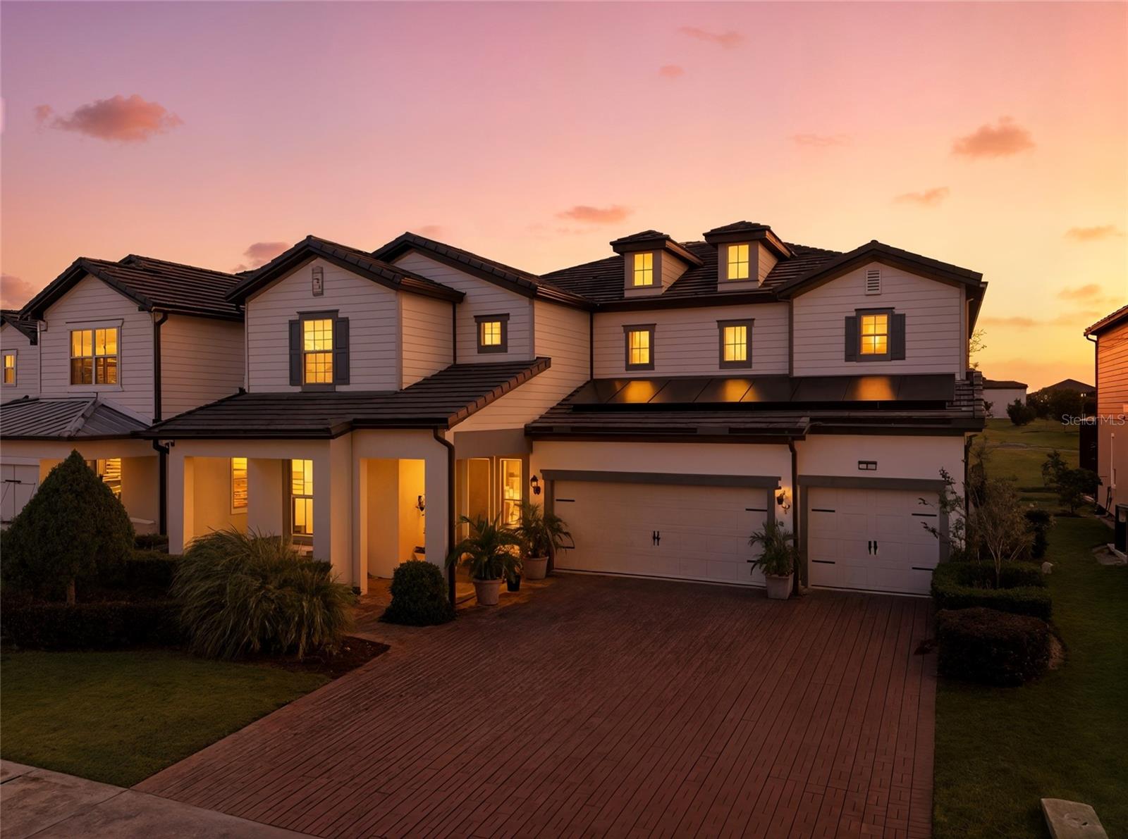 MOTIVATED SELLER! Offering closing costs assistance towards rate buy down!This extensively upgraded home offers the perfect blend of luxury, comfort, and energy efficiency — ideally situated just minutes from Walt Disney World, fine dining, upscale shopping, and Orlando’s world-renowned theme parks.Located in an A+ rated school district, this residence also includes access to resort-style community amenities such as a park, pickleball court, walking trail, pool, and splash pad.Inside, the home showcases over $100,000 in custom upgrades, featuring energy-efficient LED recessed lighting, elegant accordion sliding doors that open to a fully enclosed lanai, and an extended, professionally landscaped yard perfect for outdoor entertaining.The designer kitchen includes a full-wall backsplash and a custom dry coffee bar, while the primary suite bathroom has been beautifully remodeled with a newly tiled walk-in shower. A new roof and HVAC system (installed in 2021) and solar panels help keep utility costs remarkably low — averaging just $35/month for electricity.Offering six spacious bedrooms and six bathrooms, this home is designed for flexibility and privacy. Five bedrooms include private en-suites, and both levels feature primary suites with their own sitting areas, making this property ideal for multi-generational living or a Next Gen setup.Upstairs, enjoy a spacious loft and a private theater room complete with an installed projector and screen — perfect for movie nights or entertaining guests.Blending style, functionality, and sustainability, this exceptional home presents a rare opportunity to live in one of Orlando’s most sought-after communities.Schedule your private showing today