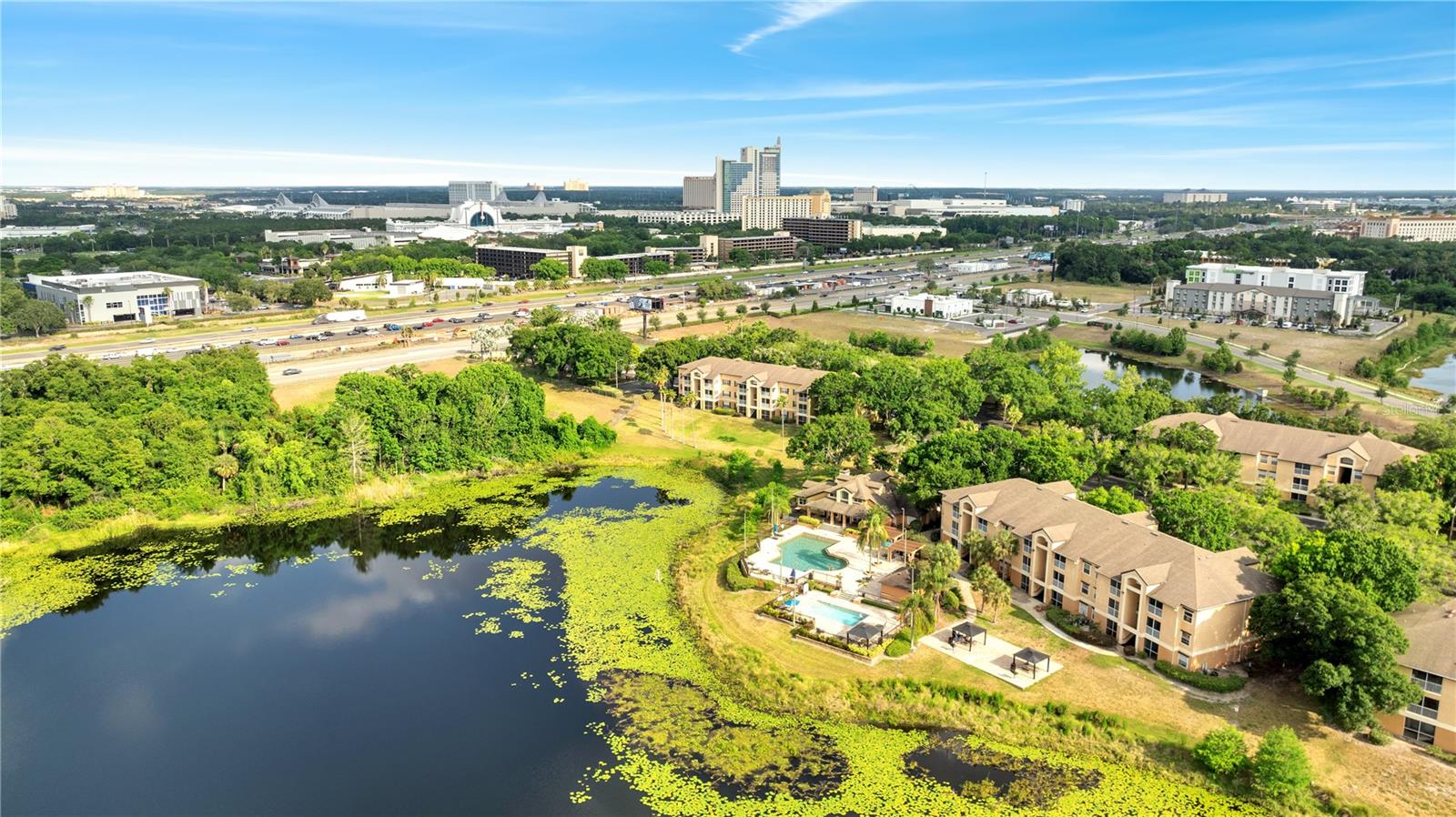 Experience the perfect blend of comfort and convenience in this 1 bedroom, 1-bathroom lake view condo! Located within the Sand Lake Private Residences community in the heart of Doctor Phillips—one of Orlando’s most sought-after areas, renowned for its top-rated schools. This beautifully maintained 2nd floor unit offers 671 sq ft of thoughtfully designed living space, featuring an open floor plan with 1 spacious bedroom, its own full-sized bathroom, and a large walk-in closet. The kitchen is equipped with stainless steel appliances, a breakfast bar with seating area, ample cabinetry, a pantry, and a separate laundry room with a washer and dryer included. The kitchen seamlessly flows into a spacious dining area overlooking a large living room that opens to a cozy screened-in patio, complete with an outdoor storage closet, and peaceful lake-facing views. The bathroom has been tastefully updated—making this home ideal for buyers seeking a turnkey, low-maintenance property in the Dr. Phillips area. HOA includes water, trash, sewer, and access to an impressive array of amenities, including two lakefront pools, a clubhouse with a 24-hour fitness center, tennis, volleyball, and basketball courts, a dog park, playground, car wash stations, and BBQ areas. Residents can also enjoy a private dock on Sand Lake, perfect for fishing and taking in stunning sunset views and nightly Disney fireworks shows. This central Orlando condo is just minutes from Restaurant Row, International Drive, the Orlando Eye, Universal Studios, SeaWorld, Disney World, Epic Universe, and all major highways, including I-4, Turnpike, and 528. It’s also conveniently located near Orlando Health Dr. Phillips Hospital, Downtown Orlando, Orlando International Airport, and premium shopping outlets. Don’t miss your chance to own a stylish and updated condo in one of Orlando’s most convenient and high-demand locations—schedule your private tour today!