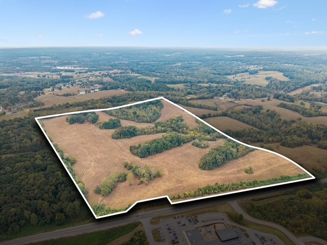 Positioned on Hwy 96 in Burns TN, this approximately 90-acre tract offers a compelling opportunity for residential development. The property is adjacent to Stuart Burns Elementary School and Burns Middle School. Rezoning is currently in progress, with R-3 High-Density Residential proposed. Buyers should verify zoning status, permitted uses, utilities, access, and development potential with the appropriate authorities.