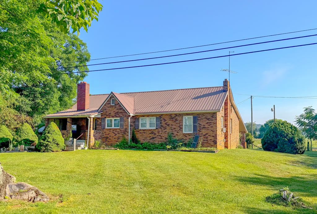 Property is being sold as-is and at assessed value. Brick Ranch on 13+ Acres – The Perfect Mini Farm in Max Meadows! Discover the freedom and possibilities that come with owning 13+ acres in the beautiful countryside. This three-bedroom, one-bath brick home offers over 1,600 square feet of comfortable living space. Inside, you'll find a spacious kitchen with plenty of room for preparing meals, gathering with family, and entertaining friends. The cozy fireplace creates a warm, inviting atmosphere during cooler months, while the walk-in tub adds comfort and accessibility for everyday living. Step outside and imagine the possibilities. With over 13 acres of usable land, this property is ideal for a mini farm, horses, livestock, gardening, or simply enjoying the privacy and beauty of your own slice of Southwest Virginia. Whether you've dreamed of raising animals, growing your own food, or creating a peaceful country retreat, this property provides the space to make it happen. The durable brick exterior offers timeless appeal and low-maintenance living, while the expansive acreage gives you room to expand, explore, and enjoy the outdoors for years to come. Properties offering this combination of acreage, location, and potential are becoming increasingly difficult to find. Don't miss your opportunity to own a versatile country property with endless possibilities. Schedule your private showing today and experience all this unique property has to offer. Buyer to verify internet options. All personal property remaining at closing will convey.