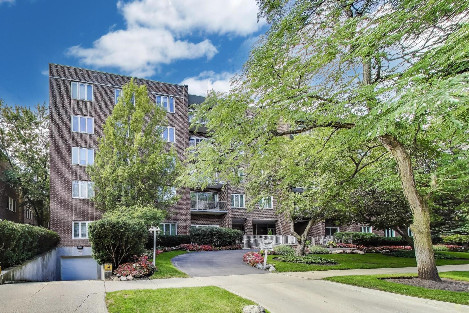 Step into this stunning and spacious 2-bedroom, 2-bathroom condo, freshly painted with new flooring and ready to welcome you home. Located on a picturesque street in the heart of Downtown Evanston, this condo offers a walk-to-everything lifestyle.    The primary bedroom is a luxurious haven with an ensuite bathroom and two expansive walk-in closets. The second bedroom offers versatility, perfect for a home office. Enjoy dining in the separate dining room, and relax in the large, bright family room.    This residence includes a heated garage space, with additional outdoor parking available on a first-come first-serve basis. The convenience of a community laundry room is just steps from your front door in this well-managed and maintained elevator building.    Just three blocks from the Davis El/Metra, your commute is effortless. Enjoy treetop views with southern exposure from this beautifully maintained elevator building.    Don't miss your chance to live in this vibrant community. Schedule a viewing today!