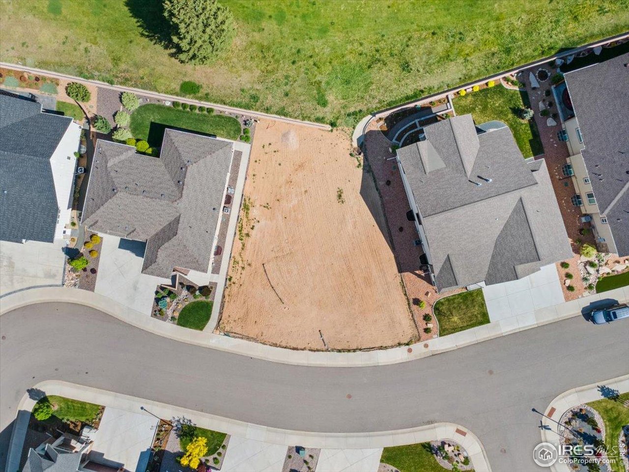 LAST LOT AVAILABLE IN MARIANA BUTTE - and one of the very few remaining golf course lots in all of Loveland. This exceptional property sits in the prestigious Mariana Butte neighborhood and comes with a major perk: NO METRO TAX.Perfectly positioned on the premier Mariana Butte 18-hole Golf Course, this lot offers unobstructed panoramic views of the fairway and the dramatic Hogback Ridge. Enjoy the beauty, privacy, and serenity of golf-course living without the maintenance.Direct access to the cart path allows you to easily reach the golf course, driving range, and clubhouse-complete with a bar and restaurant. Outdoor lovers will appreciate that the entrance to the Mariana Butte Trail System is just a block away, including the popular Hidden Hogback Trail, a 1.2-mile loop with incredible foothill and valley views.From your backyard, you can also reach the scenic Loveland Loop Trail, a 21-mile trail system that winds along the Big Thompson River, through wetlands, meadows, prairies, and around Boyd Lake State Park. The location also places you moments from Carter Lake, Lon Hagler, and Boedecker Lake, along with countless opportunities for hiking, biking, fishing, and year-round outdoor recreation.This lot offers the rare chance to build your dream home in one of Loveland's most sought-after communities. Two ranch-style floorplans that fit the lot beautifully are available from the sellers. Soils tests have already been completed-making your build process even easier.This is a one-of-a-kind opportunity to secure the last premier lot in Mariana Butte with unmatched views, exceptional amenities, and unbeatable access to Northern Colorado's best outdoor lifestyle.