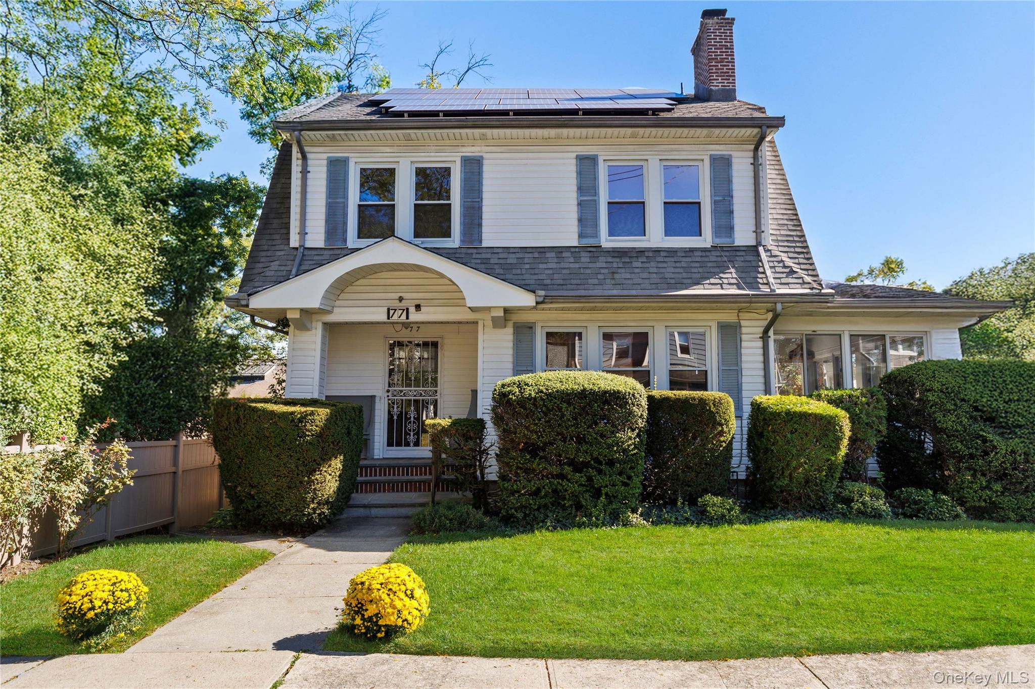 Welcome to 77 Hillside Avenue! Unlock the potential of this classic 4-bedroom colonial, ideally situated on one of New Rochelle's prettiest tree-lined streets. Perfectly located in a highly convenient neighborhood, this home offer timeless charm and endless opportunity. The first floor features a spacious living room with fireplace, an adjacent family room/sun room, an expansive dining room, a kitchen with access to the backyard – plus a full bathroom and an enclosed porch.  Upstairs, you’ll find 4 generously sized bedrooms and a hall bath. A wonderful walk-up attic adds even more living space and boasts an office/den, a full bath and plenty of storage. Outside, the house offers a charming front porch, a lush and level backyard and a one-car detached garage. The home is zoned for the highly rated William B. Ward Elementary School and is conveniently located near the New Rochelle High School, Huguenot Park, downtown restaurants and shopping, and Metro-North. The house is being sold "As-Is." Bring your ideas and vision - this house is a gem!