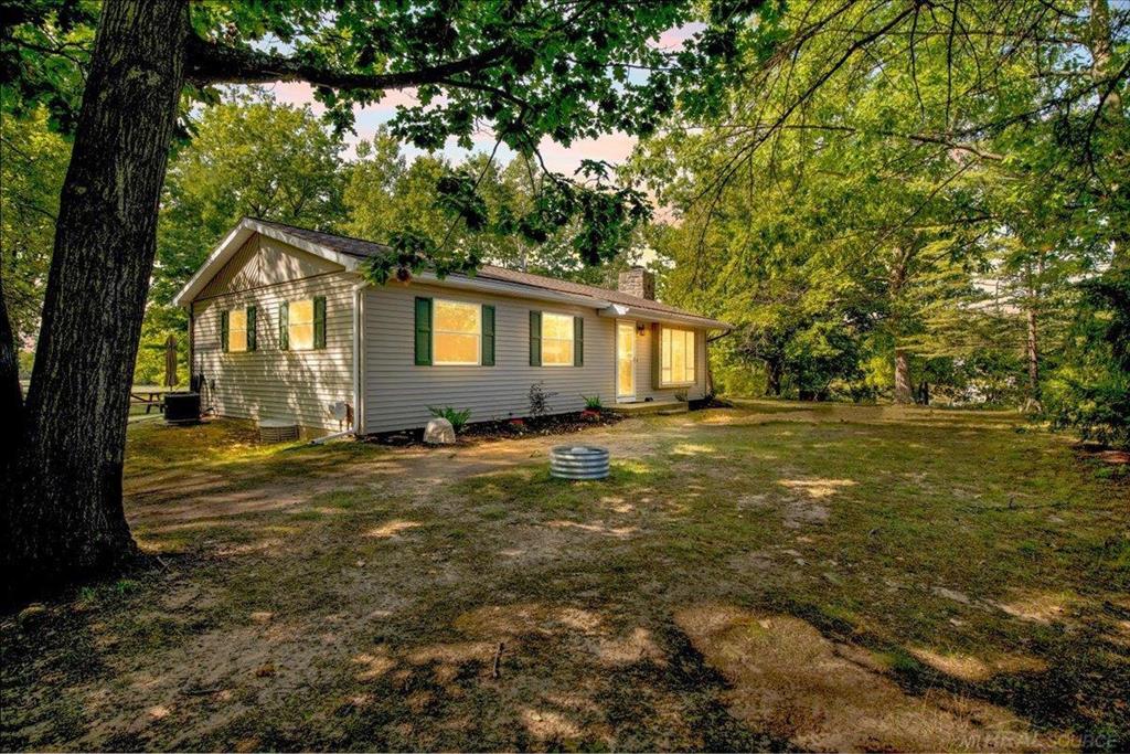 Up North feel, not so far away!!!Welcome to this Charming Waterfront Retreat on the Ross Lake with almost 2 acres, offering both Comfort and Relaxation in a Peaceful Up North setting. This Well-Maintained home features an Inviting Open Layout with plenty of Natural Light, a spacious Living room with Scenic Water Views, and a Functional Kitchen ready for Family Gatherings or Weekend Getaways. With Multiple Bedrooms and a Cozy atmosphere throughout, it's the Perfect spot for Year-round living or a Seasonal Escape. Step outside to enjoy Your Own Private Waterfront access-ideal for Fishing, Kayaking, or simply taking in the tranquil surroundings with plenty of trails on YOUR Property. The property also includes ample yard space for Outdoor Entertaining, Bonfires, and Soaking in the Beauty of Michigan Seasons. Conveniently located near Beaverton's amenities: Skiing, Golf Course, SXS Trails, Splash Pad & Park UPDATES: Dimensional Roof & Gutters,Furnace/AC, Water Heater, Tree house & Firepit