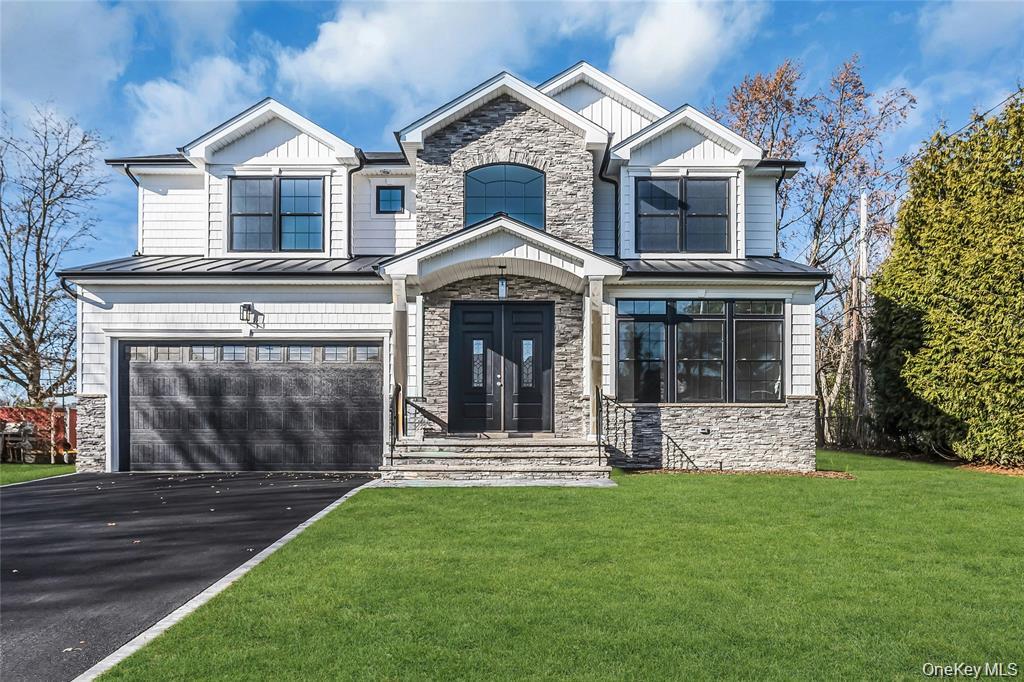 Beautiful Brand New Colonial! To be complete in April but can show exact finished one.  Open First Floor Layout with Huge Eat-In-Kitchen, White Quartz Countertops, Gourmet Commercial Appliances, Large Island with Seating, and Butler Pantry w/ Dry Bar. 9' Ceilings on First Floor with Two-Story Foyer. 5 Bedrooms/ 3 Full Bathrooms Total, Including First Floor Bedroom. Four Generous Sized Bedrooms on Second Floor Including Huge Primary Bedroom and Primary Bathroom with Two Separate Vanities, Walk-In Shower and Soaking Tub. Second Floor Laundry Room with Full Cabinets For Storage. Generous Amount Of Closets Including  Walk-in Closets in Primary Bedroom.  Hardwood Floors Throughout. Exceptional Craftsmanship and Detail with Extensive Moldings and Beautiful Coffered Dining Room Ceiling. Beautiful landscaped yard with 4 zone sprinkler system and timer and 6 ft. white vinyl fence to enclose rear yard.  This home is perfection to make memories!!!!