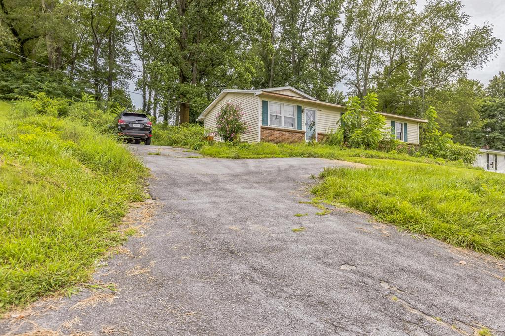 Opportunity Awaits! This property is a true diamond in the rough, offering tons of potential for the right buyer. Featuring 3 bedrooms and 2 bathrooms, this home sits on a .46 acre lot and is ready for your personal touch. Whether you're an investor looking for your next project or a homeowner eager to build equity with some TLC, this is a great chance to make it your own. Property is being sold as-is and will require repairs and updates. Bring your vision and creativity — this one won't last long at this price!