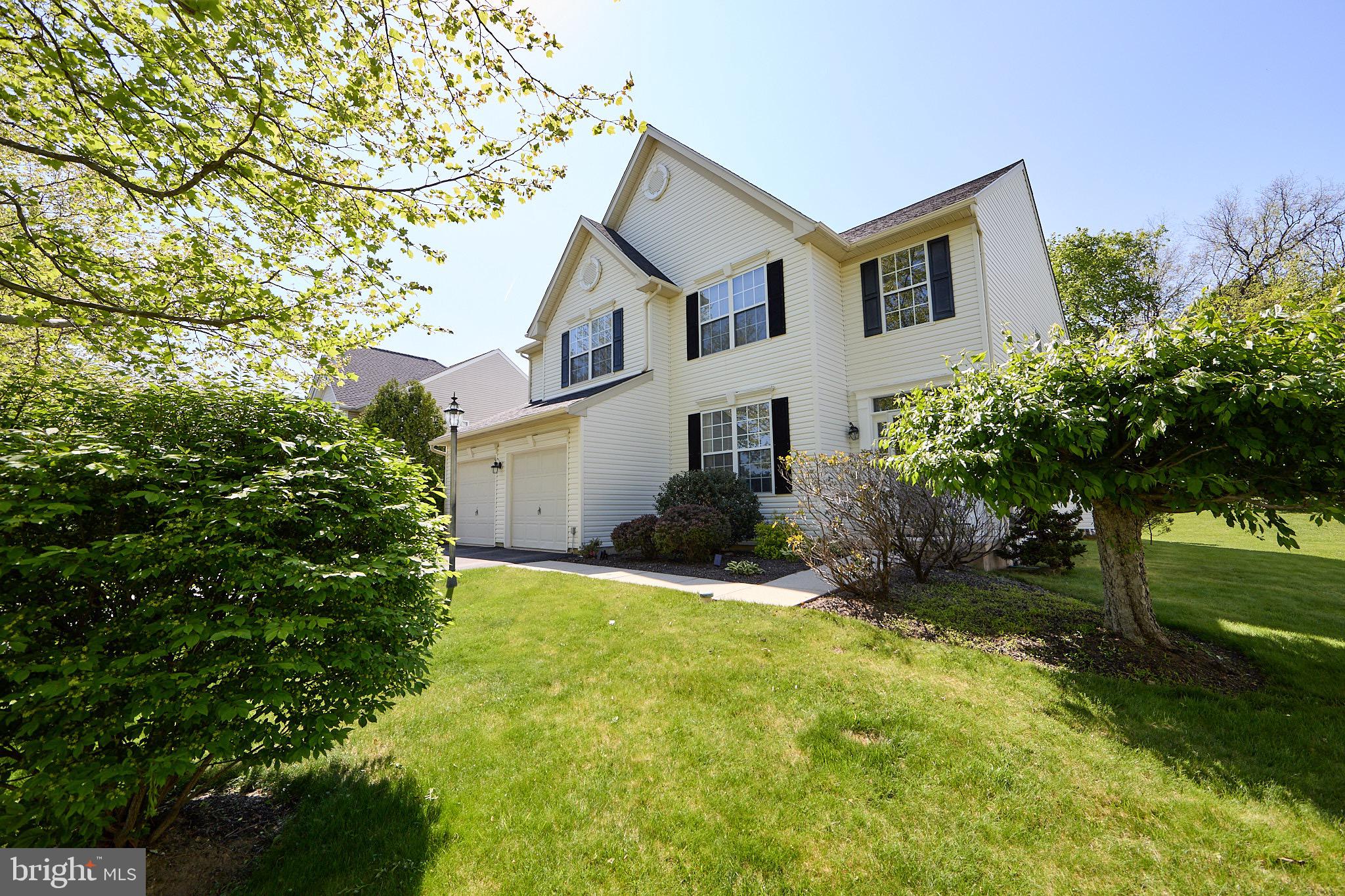 Welcome to a home that perfectly blends timeless elegance with everyday comfort, ideally situated on a premium private lot in the desirable Keats Glen community within the highly acclaimed Downingtown Area School District.  A dramatic two-story foyer sets the tone upon entry, highlighted by a striking curved custom staircase and gleaming hardwood floors that flow seamlessly throughout the main level. Thoughtfully designed for both entertaining and daily living, the formal living and dining rooms offer classic spaces for gatherings, while the heart of the home unfolds in the inviting two-story fireside family room—warm and welcoming, and open to the beautifully appointed white kitchen. Here, a sunny breakfast area overlooks the private rear setting, creating the perfect backdrop for morning coffee or casual meals. Relax and enjoy private views from the large maintenance free custom deck overlooking a private rear yard.   Upstairs, four generously sized bedrooms provide comfortable accommodations, including a spacious primary suite designed for relaxation. With 2.5 baths and a functional layout, this home offers the flexibility today’s buyers are seeking. Additional highlights include public utilities, a move-in ready condition, and a location that offers both privacy and convenience—just minutes to shopping, dining, major routes, and all that the Downingtown area has to offer  .A wonderful opportunity to enjoy space, style, and an exceptional setting—schedule your showing today.