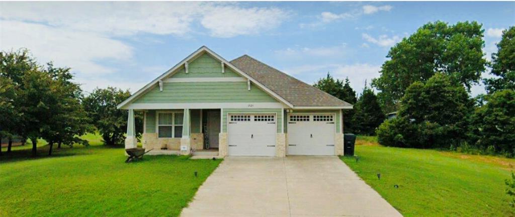 Peaceful Country Living with Income Potential! And just minutes from LAZY E ARENA!

This home qualifies for USDA LOAN 100% financing!!! this charming 2 bed, 2 bath home nestled on a gorgeous 1-acre lot with a beautifully wooded backyard and scenic views. Inside, you’ll love the open-concept kitchen, dining, and living room—perfect for gatherings or quiet evenings at home. The spacious primary suite includes a large walk-in closet and a luxurious bathroom with double vanities. A generous 2-car garage offers plenty of storage. Located just minutes from I-35 and in the sought-after Guthrie school district. Currently a successful Airbnb with future bookings already on the calendar—ideal as an income-producing property or your own private escape! Seller offering $5000 in consessions with right offer.
