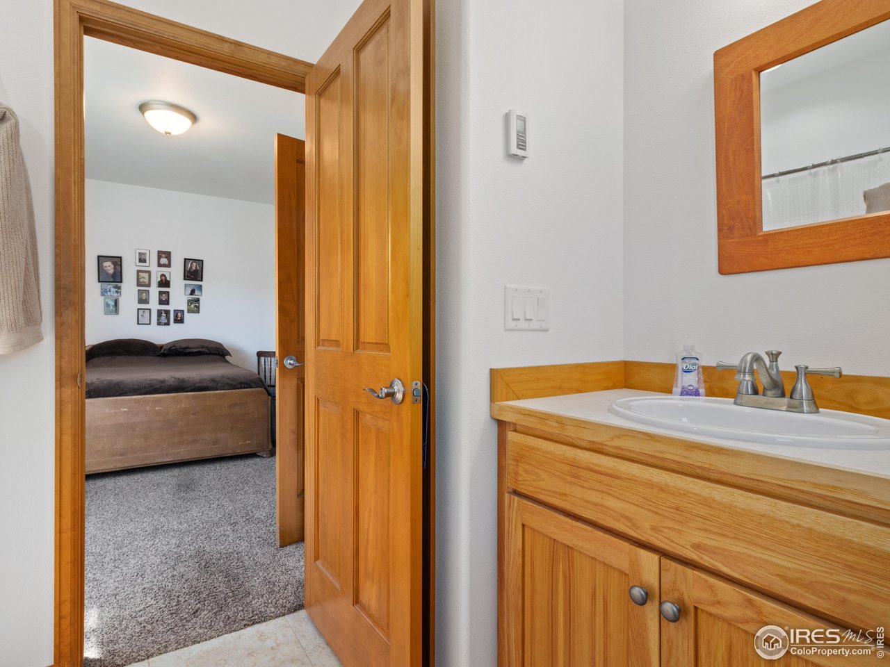 Explore this stunning 3-bed, 3-bath detached townhome, perfectly positioned in a serene cul-de-sac in the heart of Estes Park. A short walk takes you to downtown and the iconic Stanley Hotel district, offering a harmonious blend of peaceful living and convenience. You'll also enjoy quick access to the north entrance of Rocky Mountain National Park, shopping, and the local hospital. Lovingly maintained by its original owner, this home shines with custom touches and boasts breathtaking views from every window. The thoughtfully designed layout ensures privacy, with a bedroom and bathroom on each level. The loft-level primary suite features a spacious deck with picturesque views, along with a dedicated office space that overlooks the main floor and frames the distant Great Divide. On the main floor, you'll find the second bedroom and bath, along with the inviting living spaces and convenient access to the laundry area. The ground floor offers the third bedroom and bath, an oversized garage, and an outdoor patio ready for a hot tub. Short-term rentals are allowed by the HOA, but buyers should confirm current licensing requirements with the town. This is a rare opportunity to own a well-cared-for, custom home in an unbeatable location!