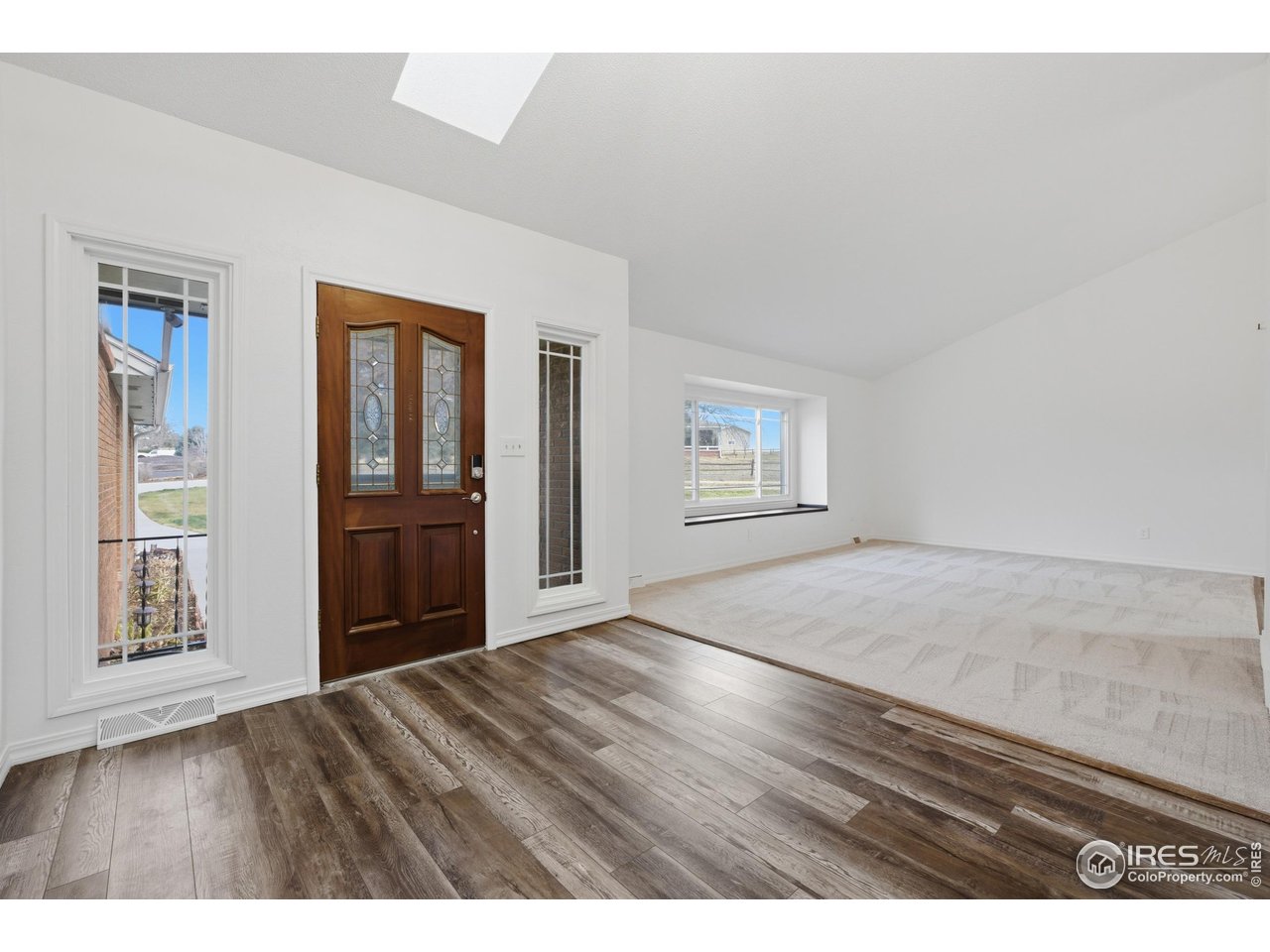 Back on the market and refreshed with new paint, new carpet, and additional updates throughout. This home is nestled on 1.16 acres and offers generous space paired with serene surroundings. Inside, three separate living areas provide flexibility for everyday living and entertaining. The home offers a beautifully updated kitchen featuring double ovens, a oversized gas cooktop, a large eat-in island, and abundant custom cabinetry.The home includes four bedrooms and three tastefully renovated bathrooms. A sun-drenched attached sunroom showcases an oversized hot tub, creating a relaxing retreat that can be enjoyed year-round. For vehicle and hobby enthusiasts, the property boasts an oversized two-car attached garage, a detached garage, and an impressive 1,200-square-foot shop built in 2022 with 12-foot pull-through doors.With the new improvements, fresh finishes, and room to spread out both indoors and out, this property offers the tranquility of country living while providing exceptional functionality, privacy, and picturesque views.