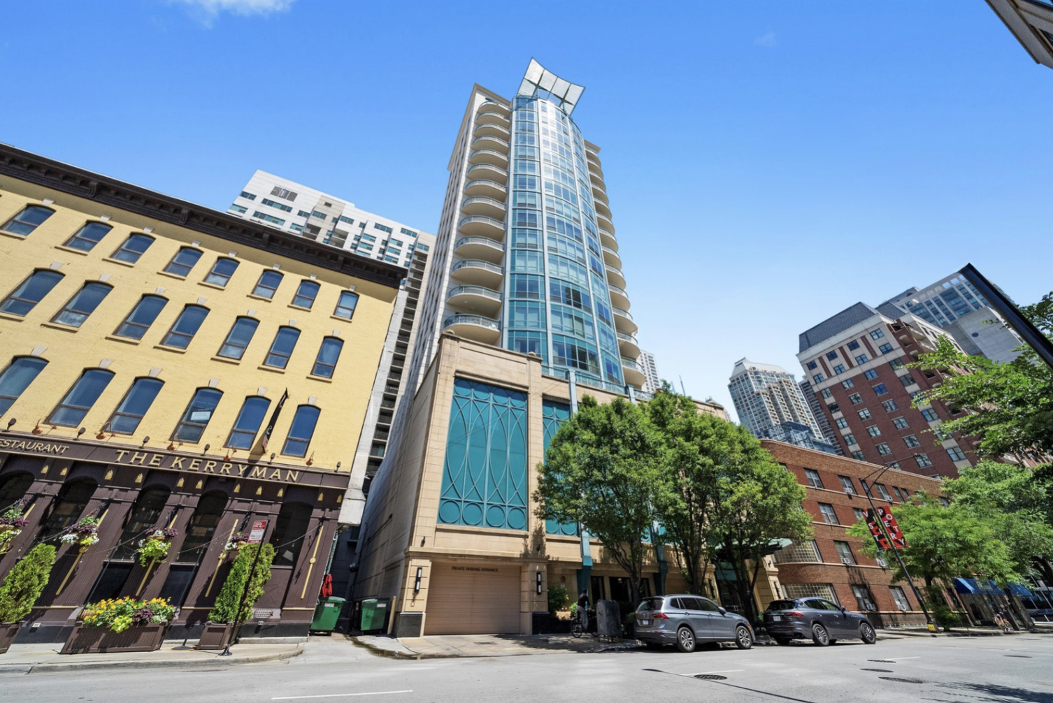 Rarely available, this beautiful 3 bedroom, 2.1 bath residence at 60 W Erie offers the ultimate in downtown city living within a luxury boutique building designed by renowned architect Lucien Lagrange. Ideally located in the heart of River North, nestled on an incredibly quiet street, you'll enjoy fantastic outdoor space, modern amenities, and access to the best of Chicago- just steps from everything! With only two residences on the floor, this bright corner unit provides exceptional privacy and is bathed in natural light from expansive floor-to-ceiling windows in every room. Enjoy true indoor/ outdoor living from not one, but two oversized private terraces! The entire home has been freshly painted, showcasing its soaring ceilings and rich, dark-stained hardwood floors that flow seamlessly throughout the spacious interior. The generous living and formal dining area opens onto a show-stopping, south-facing terrace with mesmerizing panoramic city views- perfect for hosting, alfresco dining, and everyday living. The chef's kitchen is outfitted with Sub-Zero and Wolf appliances, granite countertops, a stylish backsplash, and generous space for a center island. All three bedrooms are spacious and bright. The primary suite includes another expansive terrace, a large walk-in closet, and a spa-inspired limestone bath with double vanity, soaking tub, and walk-in shower. Two additional bedrooms provide ample space for guests, family, or a home office, along with a thoughtfully appointed full bath and a sleek powder room. This intimate 24 unit building offers premium amenities including door staff, a fitness center, extra storage, a newly renovated lobby, and on-site maintenance. HOA dues includes all utilities (everything except electric) PLUS two attached garage parking spaces are included- rare find! The location is truly unbeatable- walking distance to River North's top restaurants, upscale shopping, nightlife, the Riverwalk, East Bank Club, Blue Bottle Coffee, Whole Foods, the Mag Mile, and more-all within the highly sought-after Ogden School District. A must see!