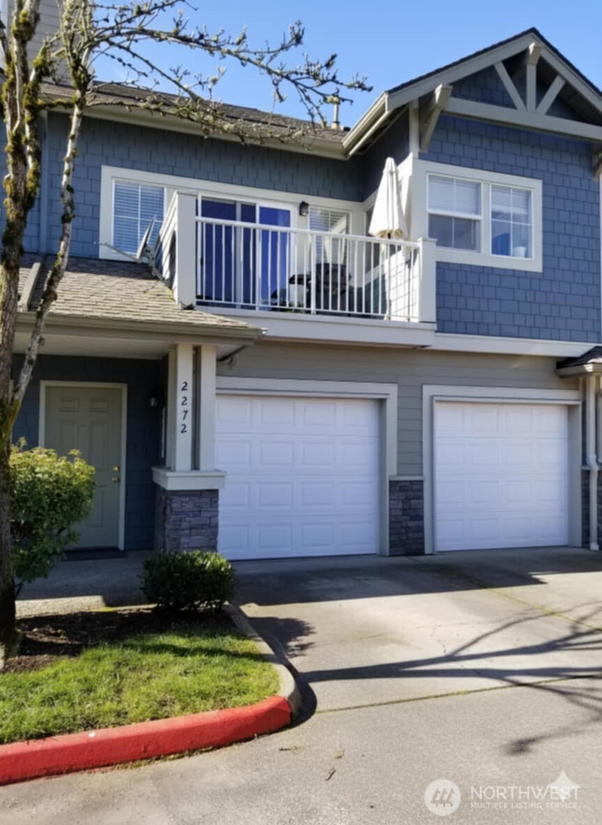 Rare opportunity in Sammamish Pointe community. This conveniently located condo boasts privacy, modern updates and abundance of natural light. No neighbors above and below, open-concept living area with high ceiling and gas fireplace, and large private balcony. Updated kitchen w/quartz countertops and a generous island - ideal for casual meals & entertaining. Large corner bedroom with thoughtfully updated walk-in closet. New engineered hardwood flooring thorough the unit. Top floor unit with a private single car garage below allows for additional storage space, plus guest parking nearby. Well-maintained HOA, covers water and sewer. Short distance to shopping, restaurants, hiking, and easy I-90 access. Pet-friendly community w/no rental cap.