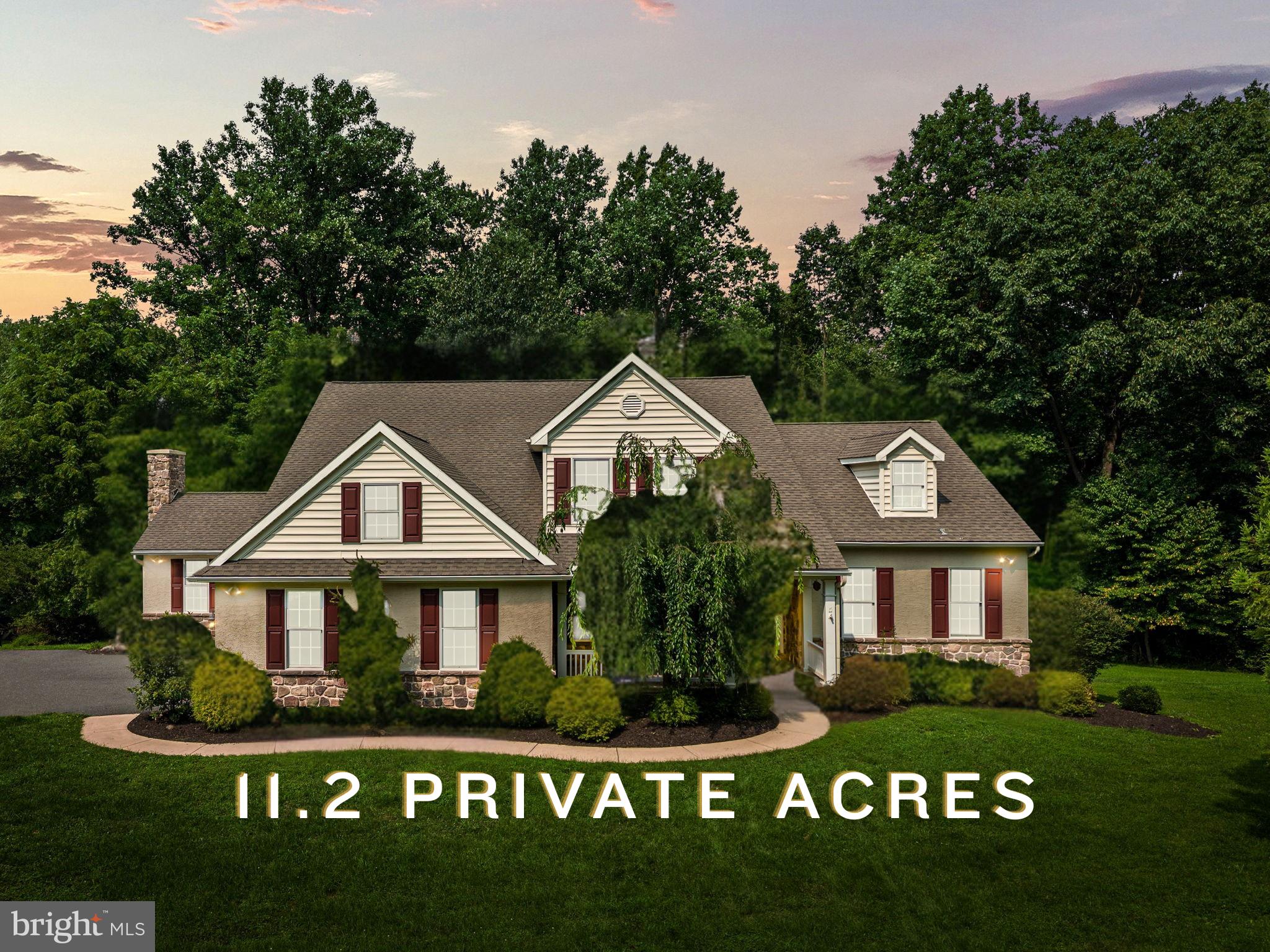 At the end of a quiet cul-de-sac, beyond a private lane shared with only five other homes, 60 Homestead Lane offers a lifestyle defined by space, serenity and extraordinary privacy. Set on 11.2 wooded acres in Glenmoore, this custom-built 2007 Craftsman inspired modern farmhouse is being offered for the first time by its original owner. Imagine mornings surrounded by nature and evenings spent on the expansive deck off the kitchen, overlooking your own peaceful kingdom. Explore the woods, create private hiking trails, enjoy fort building adventures or hunt on your own land. Here, the property is more than a beautiful setting, it is a place to explore, recharge and make lasting memories.Inside, the open floor plan creates an effortless flow for everyday living and entertaining. A separate dining room off the kitchen provides a welcoming space for holiday dinners and special celebrations. The sought-after first-floor primary suite offers comfort, privacy and the convenience of main-level living.Sunlight fills the den, where a wood burning fireplace and peaceful views set the tone for quiet mornings and cozy evenings. This flexible room can become a home office, library, art studio, craft room, additional sitting room or personal retreat, the possibilities are nearly limitless.With 4 bedrooms and 2.5 baths, the home provides room to gather as well as space to unwind. The finished walkout basement extends the living area and includes an exceptional amount of storage. A side entry two car garage and generous driveway provide plenty of parking for holidays, entertaining and overnight guests, while an invisible pet fence offers added freedom for Fido.The HVAC and AC were replaced in 2022 and include a whole-house humidifier/dehumidifier and air scrubber.  A water softener has been added to enhance your free (well) water. The 11.2-acre property is enrolled in Pennsylvania’s Act 319 Clean and Green program, providing the benefit of preferential land assessment and lower property taxes.For those seeking even greater privacy and land ownership, neighboring 70 Homestead Lane (PACT2130058)is also being offered for $350,000. It may be purchased together with 60 Homestead Lane or sold separately, presenting a rare opportunity to expand and help protect the privacy surrounding your estate.If you have been searching for a private Chester County home with acreage, a first-floor primary suite, finished walkout basement, wooded trails and an open-concept design in one of Pennsylvania’s top-rated school districts (Downingtown Area School District - West High School), 60 Homestead Lane is the exceptional retreat you have been waiting for.