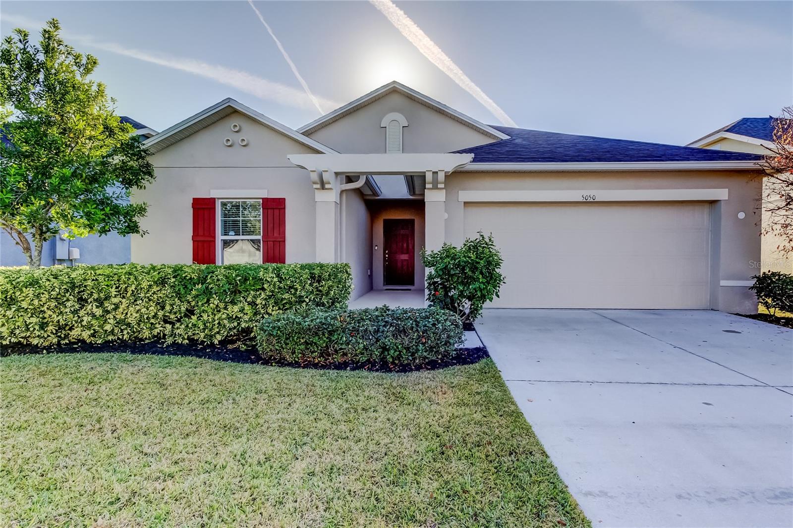 Is there a 3-bed single family home in Wesley Chapel under $350K with HOA-covered internet and cable? Yes, 5050 Suncatcher Drive, a move-in ready, beautifully maintained 1,593 sq ft single-story residence in the heart of Wesley Chapel. This 3-bedroom, 2-bath, 2-car garage home features a desirable split bedroom floor plan designed for both privacy and functionality.Step inside to a bright, open layout offering a spacious great room, an eat-in kitchen with island, walk-in pantry, and a dedicated laundry room. The primary suite serves as a private retreat with two walk-in closets and an en-suite bath. Enjoy indoor-outdoor living with a fenced backyard, perfect for pets, play, or entertaining.Recent updates provide peace of mind, including fresh interior paint throughout (January 2026) and a completed 4-point inspection. Smart home features enhance modern living and include a Nest thermostat, Ring doorbell, and alarm management system.Residents enjoy resort-style community amenities such as two pools, dog park, playground, pickleball courts, splash pads, and more. The low quarterly HOA includes cable and internet, delivering exceptional value.Located in a vibrant, master-planned community, residents and guests can enjoy a large list of amenities including restaurants, ISI Gym, dog bakery, barbershop, Rita’s, with additional conveniences coming soon.This home offers the perfect blend of comfort, convenience, and lifestyle schedule your private showing today.