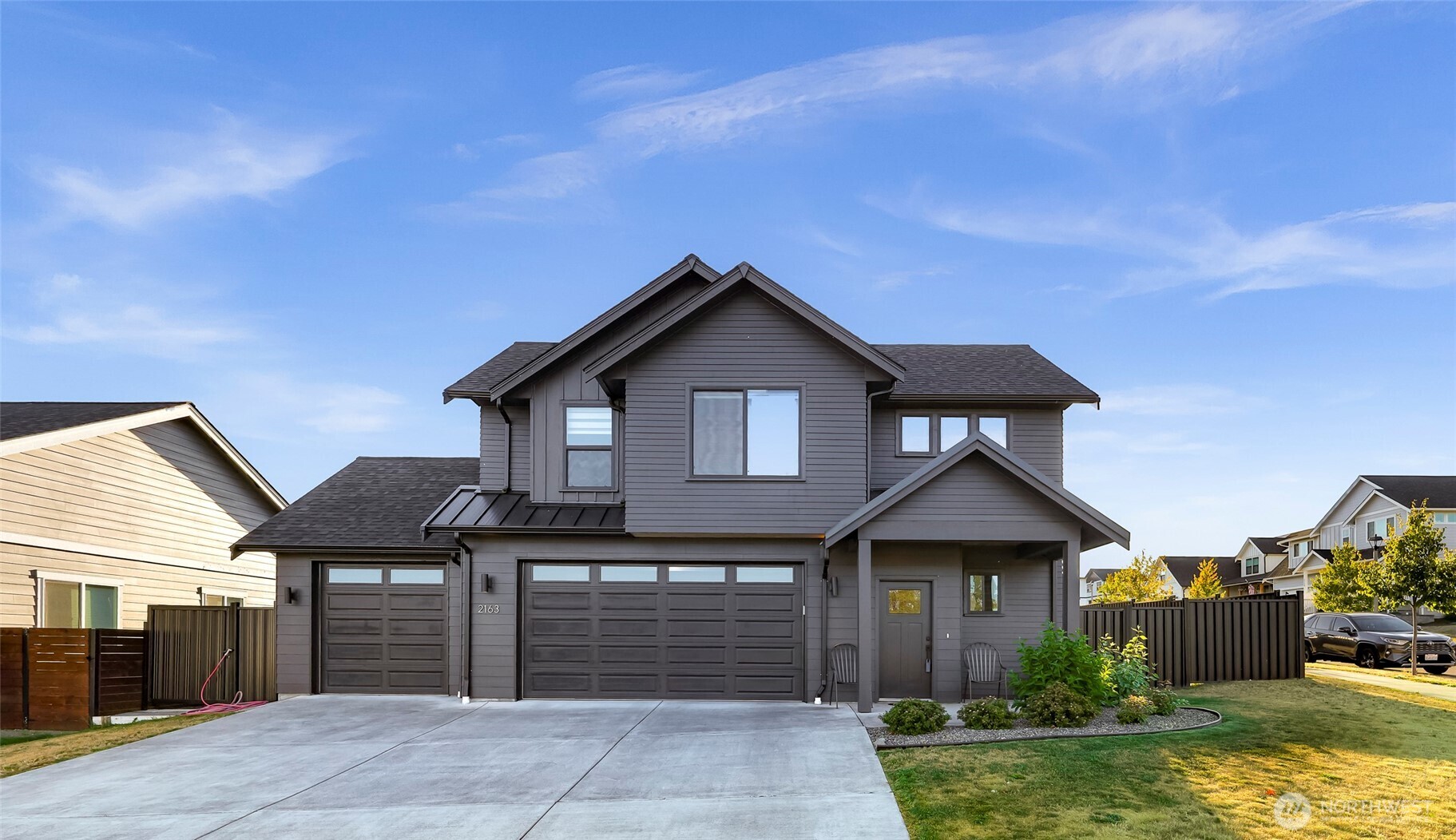 Like New!! You must see this barely lived in & stunning 4-bed home with 2,398 sq ft of thoughtfully designed living space! The main floor features an open-concept living area centered around a shiplap-wrapped fireplace, a convenient washroom for guests, and a spacious primary suite with a ¾ bath & walk-in closet (plumbed for 2nd laundry). The modern kitchen boasts quartz counters, subway tile backsplash &  ample cabinetry. Upstairs offers 3 additional bedrooms, a full bath, and a versatile bonus room which is perfect for a home office or playroom. The large 3 car garage provides plenty of space for projects or storage. Enjoy outdoor entertaining on the covered patio. Comfort and style meet in this beautifully finished home. Don’t miss it!