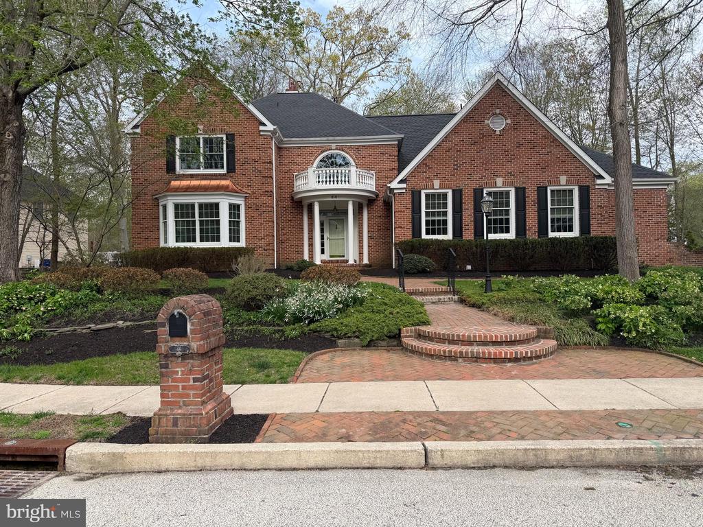 Welcome home to the  prestigious Wellesley Hunt  Community to a classically elegant brick home with side entry garage.  This custom built Sharpton model  is nestled on a professionally landscaped  and wooded  1/2 acre home site with fenced yard, architecturally styled shed, stone patio, playset and even your own  putting green! An impressive tiered landscape and brick walkway introduce you to the Georgian style brick home you will be proud to own.  This home is perfect for a growing family, or multi-generational family who require a first floor owners suite.   A dramatic  2 story foyer, displays custom millwork, replete throughout the home,  as well as hardwood flooring that flows througout mos of the first level of this wonderful home. There are 3 fireplaces in  the home including the first floor study, gathering room and upstairs bedroom.  On the first level, French doors lead to a classic  executive office/study with custom built in desk,  brick fireplace, couffered ceiling with wood beams, large bay window overlooking the front landscape. The Owner also utilizes this room as a bedroom,  An elegant first floor Owner's Suite overlooks the rear landscape and provides 2 closets, as well as spa style owner's bath with shower and soaking tub.  The Gathering Room boasts gas fireplace, hardwood flooring, andTriple Anderson French Slider with transom window that opens to the paver patio at the rear yard.  A chefs'kitchen displays built in refrigerator /freezer, white cabinerty, quartz countertops, new dishwasher,  gas cooktop, double ovens, drawer microwave andconvenient eat in breakfast bar that overlooks a sunroom  with dramatic  walls of windows. For formal dinners a spacious  dining room sits at the rear of the home with charming bay window overlooking the pretty landscape outdoors.  Climb the elegrant foyer staircase to 3 additional voluminous bedrooms, 2 with  ensuites and 1 with cozy fireplace and triple window overlooking the rear yard landscape. A large laundry room on the first level includes built in  floor to ceiling cabinetry, built in laundry sink, tile flooring and newer washer and dryer.The finished basement boasts a home theatre, additional playroom, and office, art studio area as well a plentiful storage.   This home proudly displays  newer features  you will appreciate including roof, gutter guards, newer carpets upstairs, upgraded water heater, paint, Conveniently located close to 295 and the turnpike, great schools, and excellent shopping. This special home is ready to be your very own.