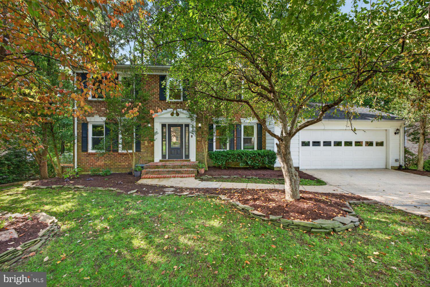 Welcome to this beautifully renovated home backing to woods in Burke. With 5 bedrooms, 3.5 baths, and three finished levels, this home offers plenty of space inside and out. Fresh paint and newer flooring extend throughout all three levels, while the expanded kitchen, beautifully updated primary suite, and screened Trex deck overlooking the wooded backyard are just a few of the standout features.The renovated and expanded kitchen is designed for both everyday living and entertaining, with stainless steel appliances including two ovens and a built in microwave and plenty of workspace. A window over the sink overlooks the trees, while French doors open directly to the screened deck. The main level also offers a living room and a comfortable family room featuring a brand new gas fireplace and built-in shelving, creating a cozy gathering space on cooler evenings. A mudroom with a washer and dryer helps keep everyday life organized, and a half bath completes the main level.Upstairs, you’ll find four bedrooms and two full baths. The spacious primary suite features a spectacular walk-in closet with custom built-in shelving, remodeled in 2024. The beautifully renovated primary bath offers a spa-like retreat with a rainfall shower, additional side shower heads, a freestanding tub, and heated floors.The fully finished walk-out lower level provides even more flexible living space, with a large rec room featuring a second gas fireplace and direct access to the backyard, complete with hot tub! This level also includes a fifth bedroom with egress, a full bath, and a bonus room that works beautifully as a home office, gym, or additional flex space.The screened Trex deck is the perfect place to enjoy the peaceful wooded backdrop, and the included deck heater makes it comfortable even on crisp fall days. A second wood deck off the lower level provides additional outdoor space. The approximately 550-square-foot two-car garage also features built-in shelving for added storage.Recent improvements include most windows replaced approximately three years ago, the screened Trex deck completed in 2023, the primary suite updates in 2024, and a new gas fireplace on the main level and front door and garage door opener in 2026.Zoned for sought-after Ravensworth Elementary School, Lake Braddock Middle School, and Lake Braddock High School.Excellent location just outside the Beltway with convenient access to Fairfax County Parkway, Braddock Road, and I-495. Close to the Rolling Road VRE station, George Mason University, and Burke Lake Park, with easy access to Washington, DC, the Pentagon, Reagan National Airport, Alexandria, Arlington, and Tysons Corner. Some photos are virtually staged. This home will not last, make your appointment today!