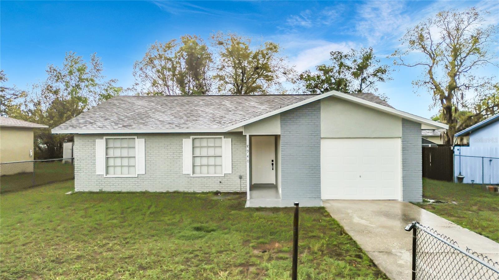 One or more photo(s) has been virtually staged. Welcome to this beautifully updated Ocala home, now featuring a brand-new 2026 roof for added peace of mind. This move-in ready property has been thoughtfully renovated with a modern kitchen, new flooring throughout, and stylishly upgraded bathrooms, creating a fresh and inviting space designed for comfortable living.Ideally located near shopping, dining, and major roadways, the home still offers a quiet residential atmosphere for everyday comfort. Opportunities like this don’t last long—schedule your showing today!