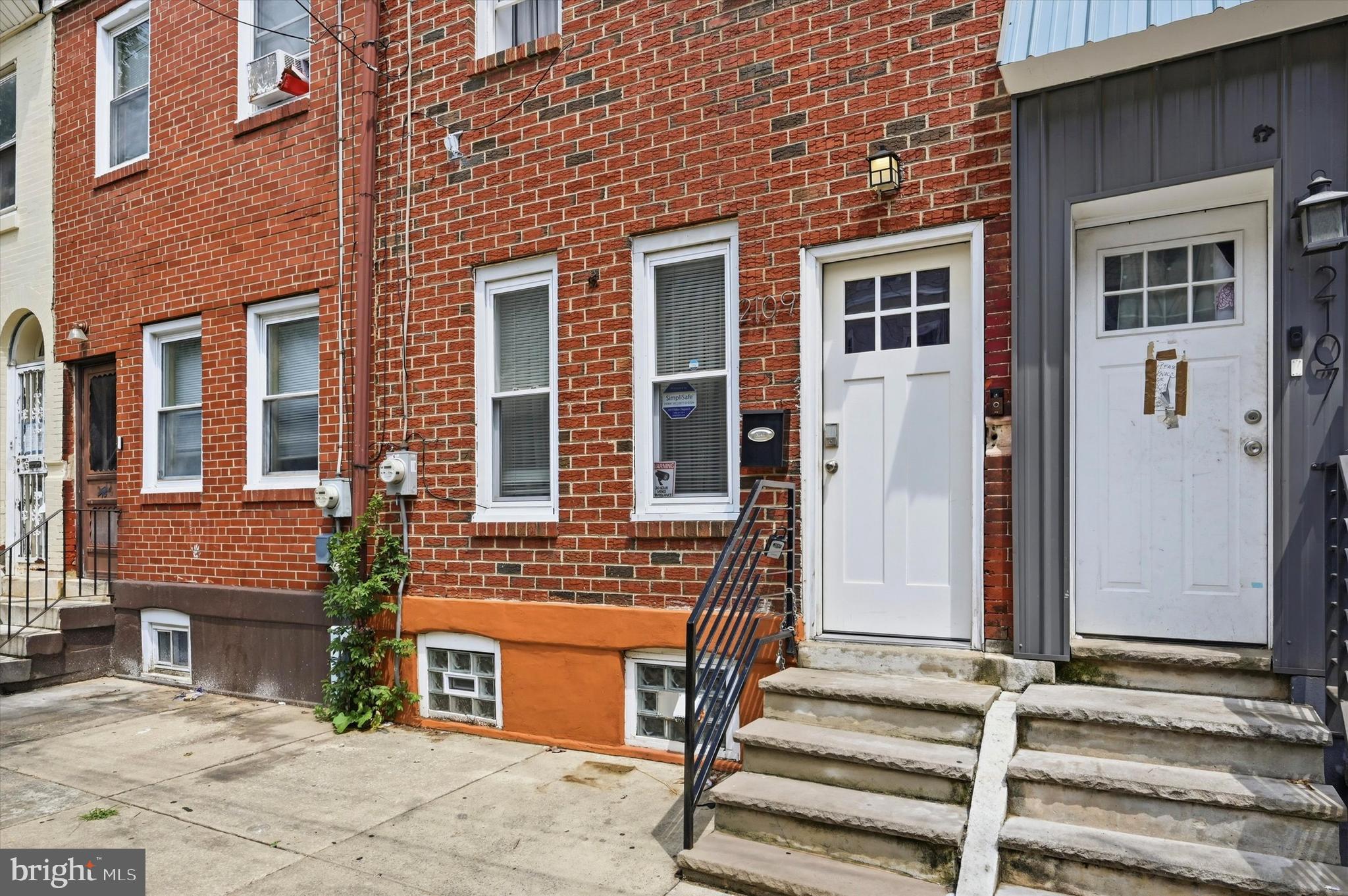 **RENOVATED 5 BED/2.5 BATH HOME JUST BLOCKS FROM TEMPLE UNIVERSITY**Once you enter the home you notice all the updates that make it feel new! Luxury vinyl floors and fresh paint in neutral colors create the perfect backdrop for all your furnishing and art. The flow of the living room to dining room has an open yet still separate feel with the convenient half bath located in between. Beyond the dining area you have a spacious kitchen with granite counters, crisp white cabinets and a nice stainless steel appliance package. There is ample room for a table or portable island making it truly eat in.  Open the back kitchen door for a true standout. This oversized paved patio is just waiting for your furniture, grill, plants and anything you need for a custom summer sanctuary. Back inside, the 2nd floor has 3 true bedrooms, ample closet space, bright windows and a modern hallway bath with sleek tile, vanity and shower/tub combo. Head on up to the 3rd floor for the additional 2 bedrooms and your 2nd full modern bath. As a huge bonus, the roof was just installed in 2026! The basement is clean, dry and houses the mechanicals and complimentary washer and dryer unit. For the location, condition and price this is a true value. Nestled between Temple University and Norris Square you are close to everything. Schedule your showing today, call for a private tour or attend an upcoming open house.