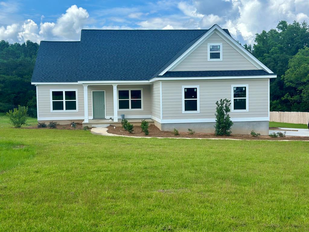 Get ready to enjoy your new home this summer! This 3-bedroom, 2-bathroom residence, currently under construction, is nestled on a spacious 1.5-acre lot, offering both tranquility and modern living. The approximate completion date is about 45 days from this publication. Step inside to an inviting open floor plan that seamlessly connects the living, dining room, and kitchen areas. The kitchen is a chef's delight, featuring a large island perfect for meal prep and casual dining, along with a generous pantry for all your storage needs. The split floor plan ensures privacy, with the primary bedroom suite located on one side of the home. The primary bathroom is a luxurious retreat, boasting a separate shower, a garden tub for relaxing soaks, and a spacious walk-in closet. Convenience is key with a mudroom entrance off the 2-car garage, providing a practical space for coats, shoes, and more. This home is designed for comfort, functionality, and style, making it the perfect place to create lasting memories.  Contact your favorite realtor to view this home today!