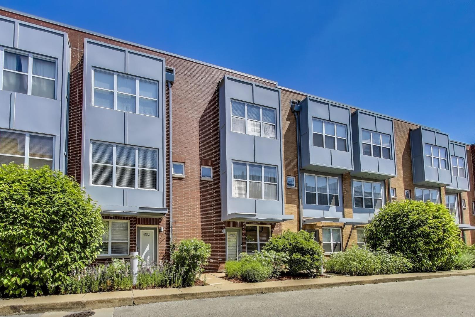 Avondale 2bed/2bath + Den, townhome, features 3-levels of living space, tall ceilings, great natural light, beautiful finishes and a 2-car attached garage.  Unit D townhome location away from Belmont with entry via a peaceful courtyard. Main level features open kitchen / dining / living room layout. 42" oversized maples cabinets, quartz counters including an island for meal prep and entertaining, stainless steel appliances, hardwood flooring, gas fireplace. Kitchen opens to walkout patio for grilling and entertaining.  3rd level features 2-bedrooms and a full (recently remodeled) bath with a double vanity and soaking tub. Bedrooms have wall to wall closets.  Washer/dryer in 3rd level.  Entry level is at grade.  Full bath on main level and attached garage access.  Den (or office/rec) room area on main level, coat and utility closet - can be walled off for 3rd bedroom.  Townhome location five min walk to Belmont Blue Line and a short drive to I90/I94.  Walk to restaurants and retail of both Avondale and Logan Square. Bus transportation on Belmont.